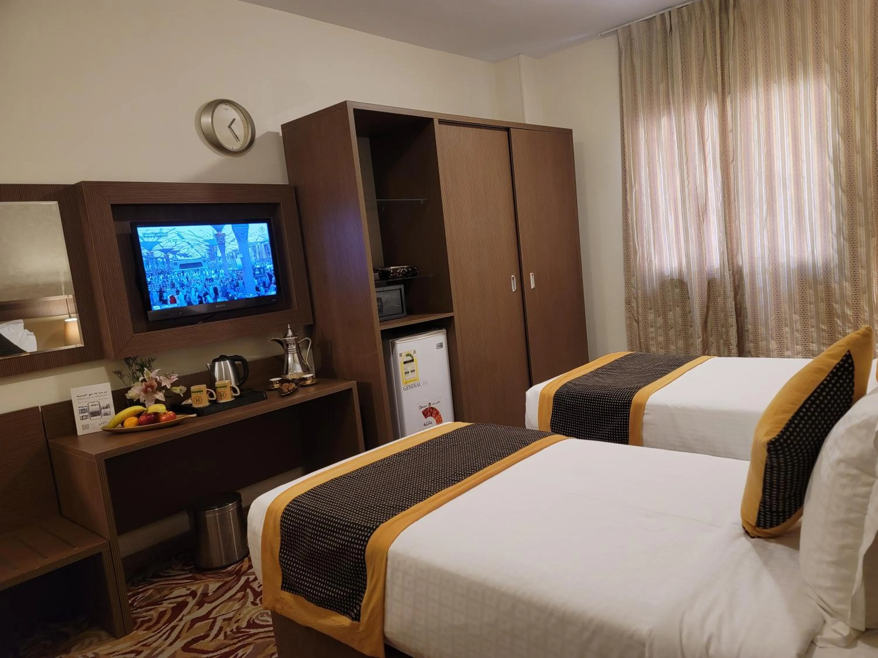 Bed in Al Ansar Palace Golden Tulip Hotel