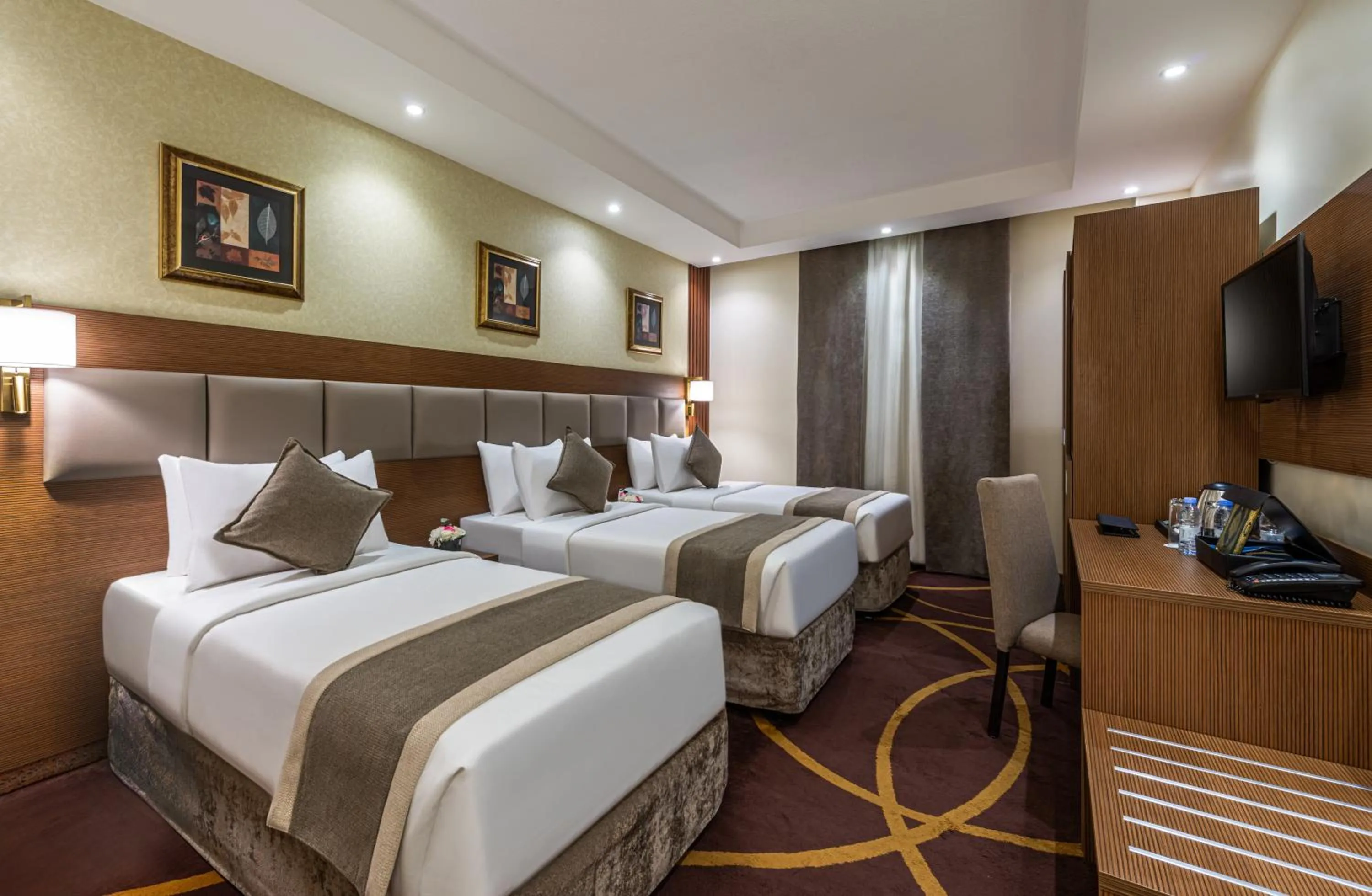 Bed in Al Ansar Palace Golden Tulip Hotel