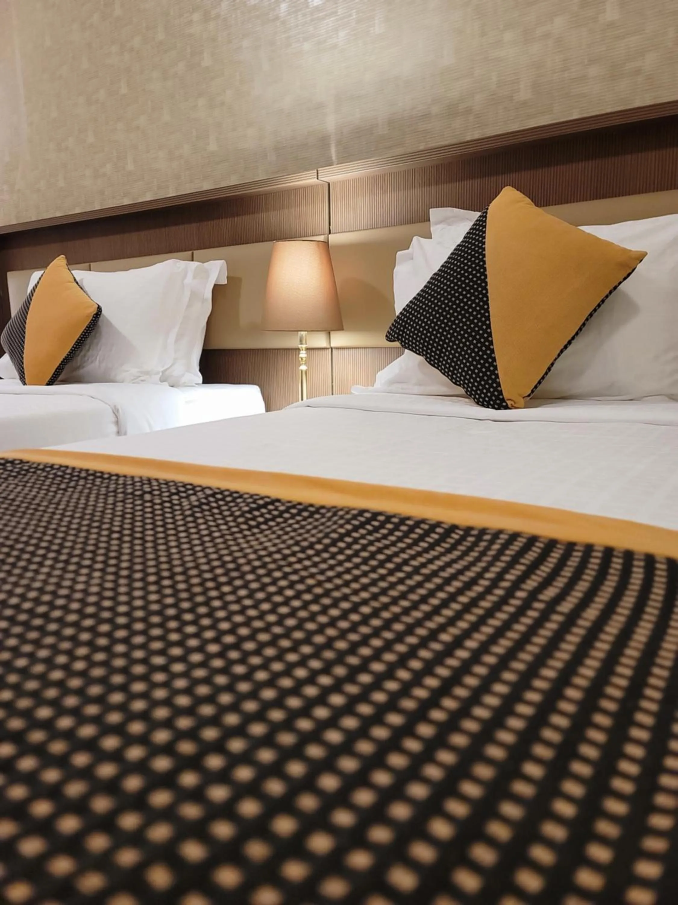 Bed in Al Ansar Palace Golden Tulip Hotel