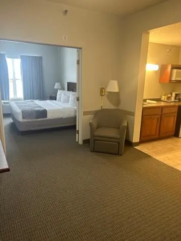 Bed in GrandStay Hotel & Suites Hastings