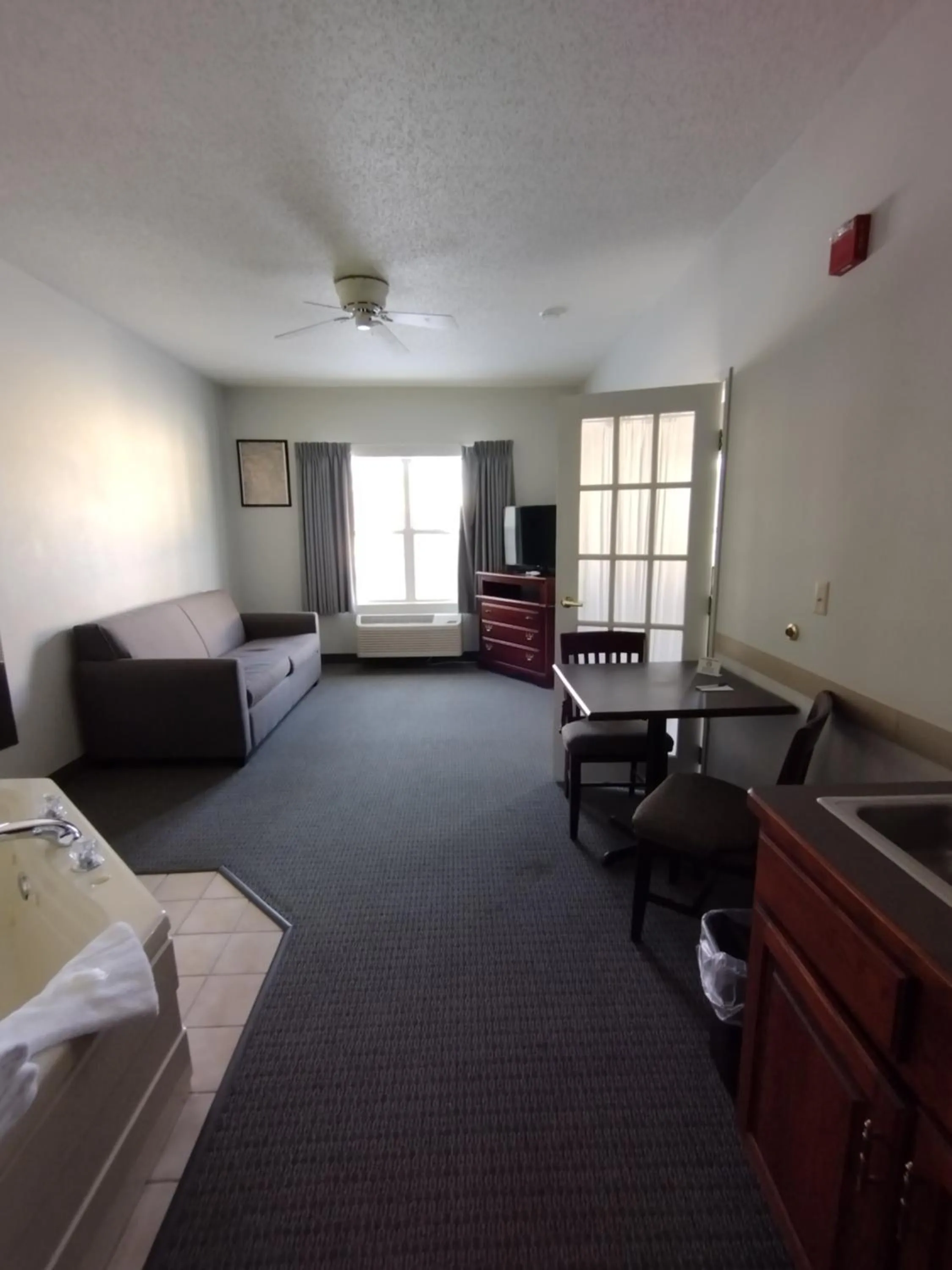 Bed in GrandStay Hotel & Suites Hastings