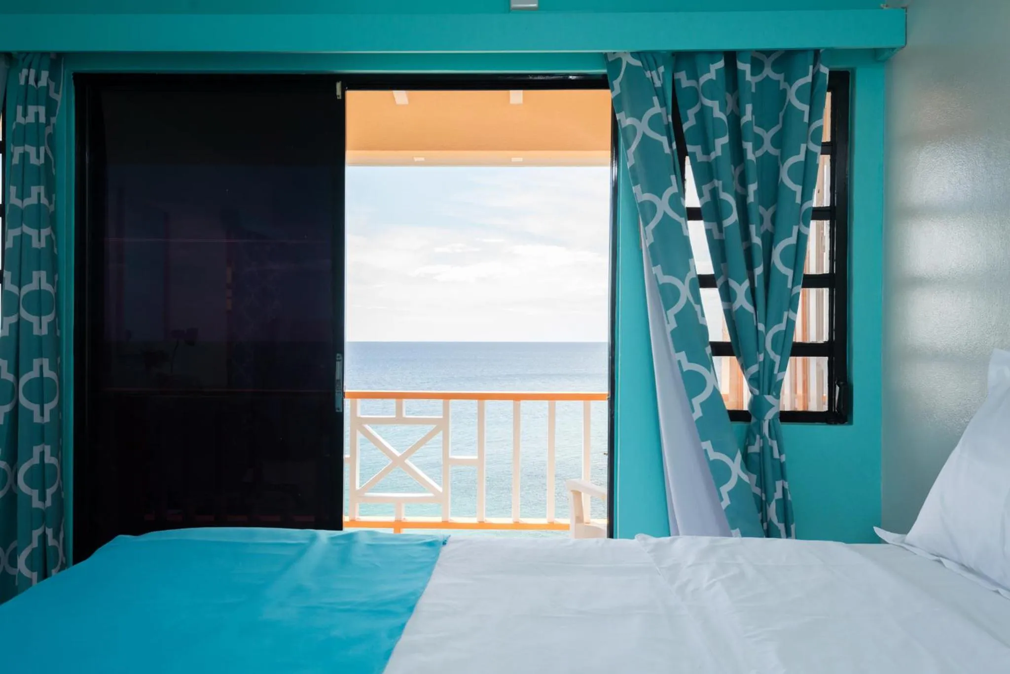 Balcony/Terrace, Bed in Bird Rock Beach Hotel