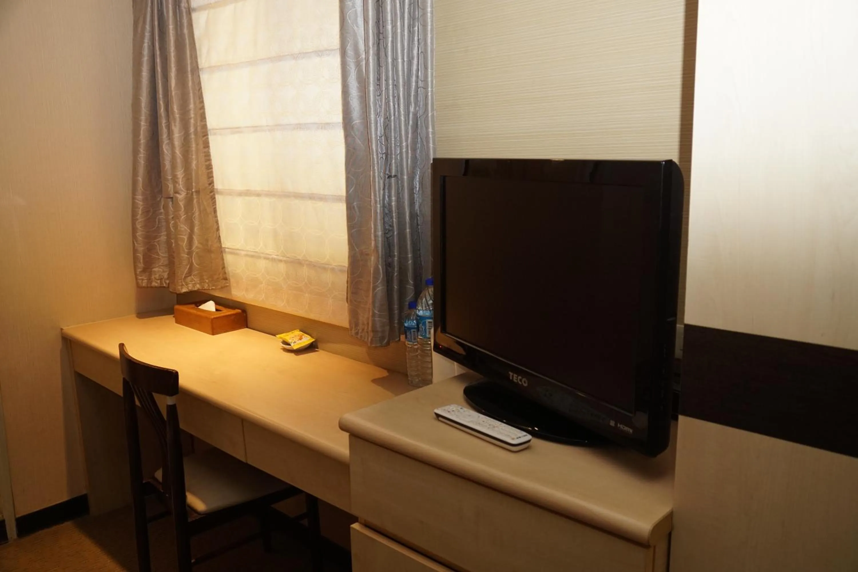 Bedroom in Dahshin Hotel