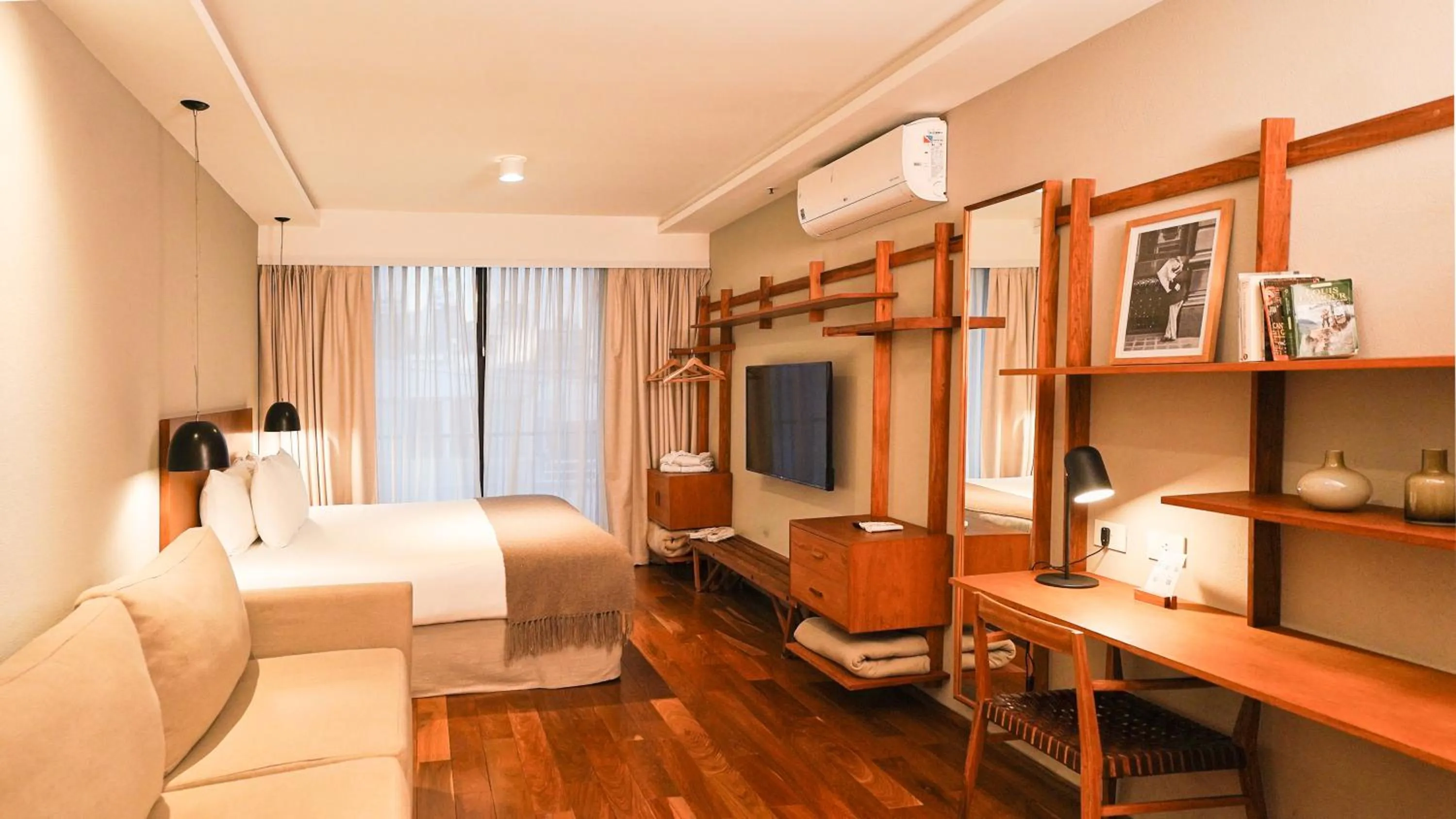 Bedroom in AQ Tailored Suites