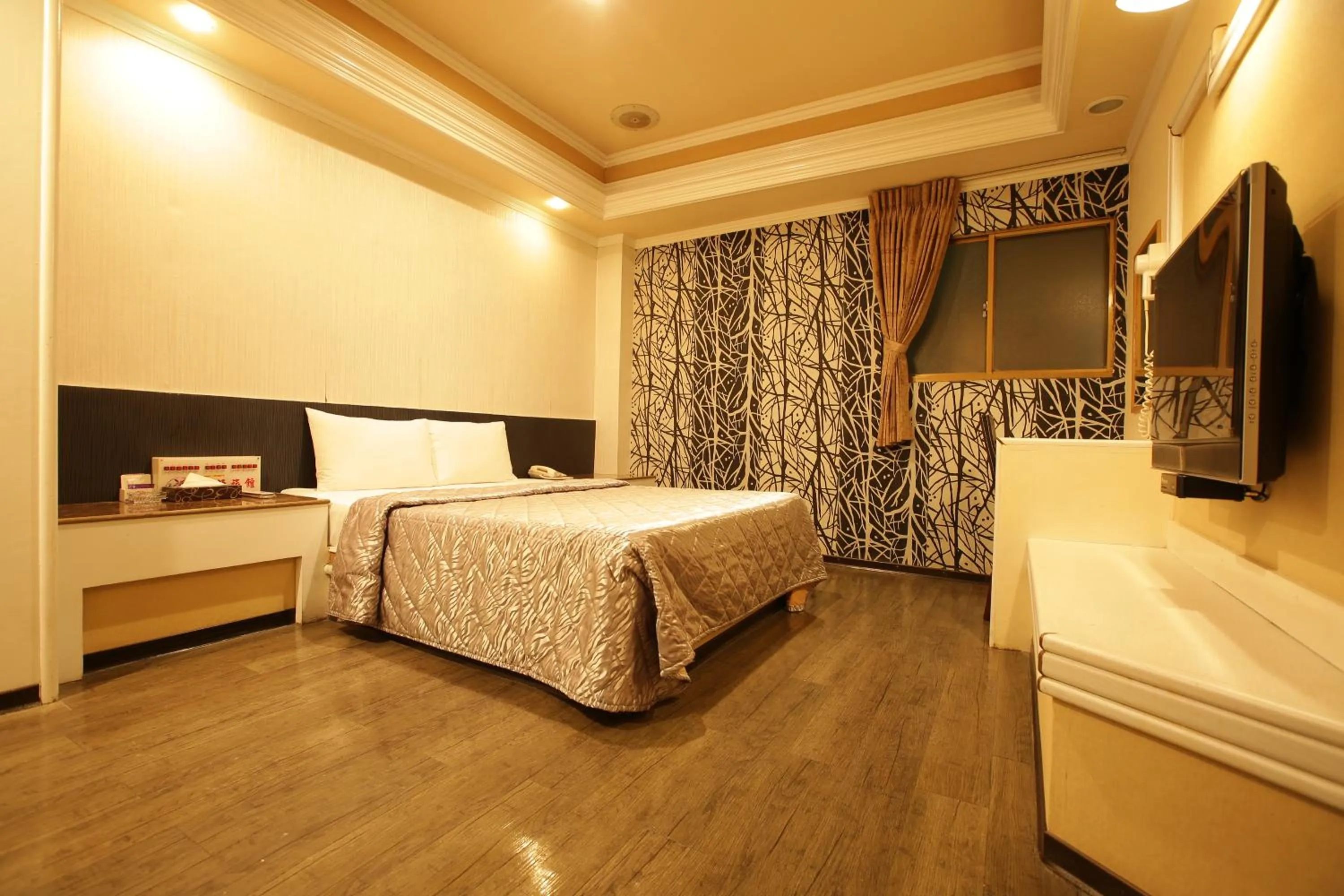 Bed in Hua Yue Hotel