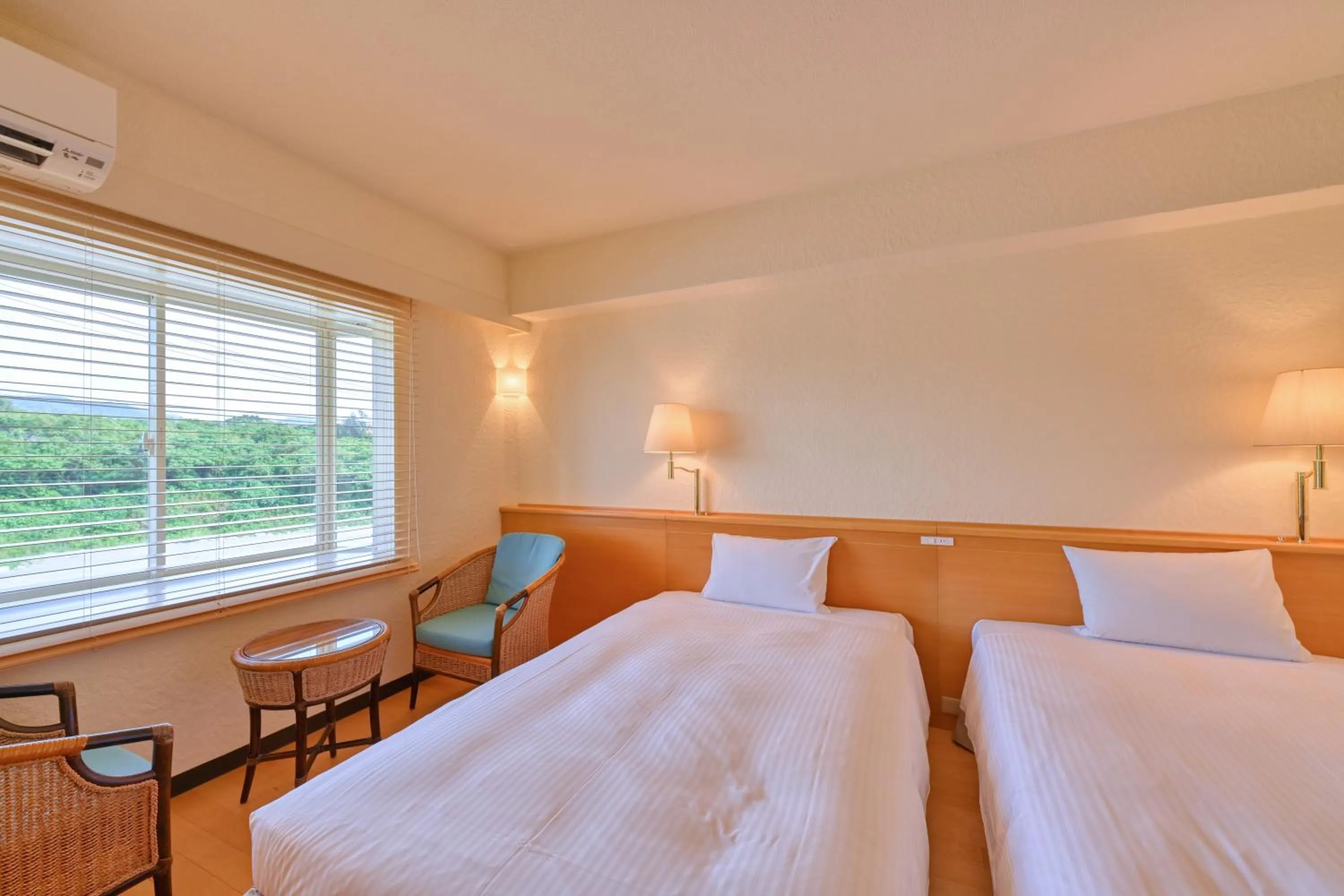 Bedroom, Bed in Beach Hotel Sunshine Ishigakijima