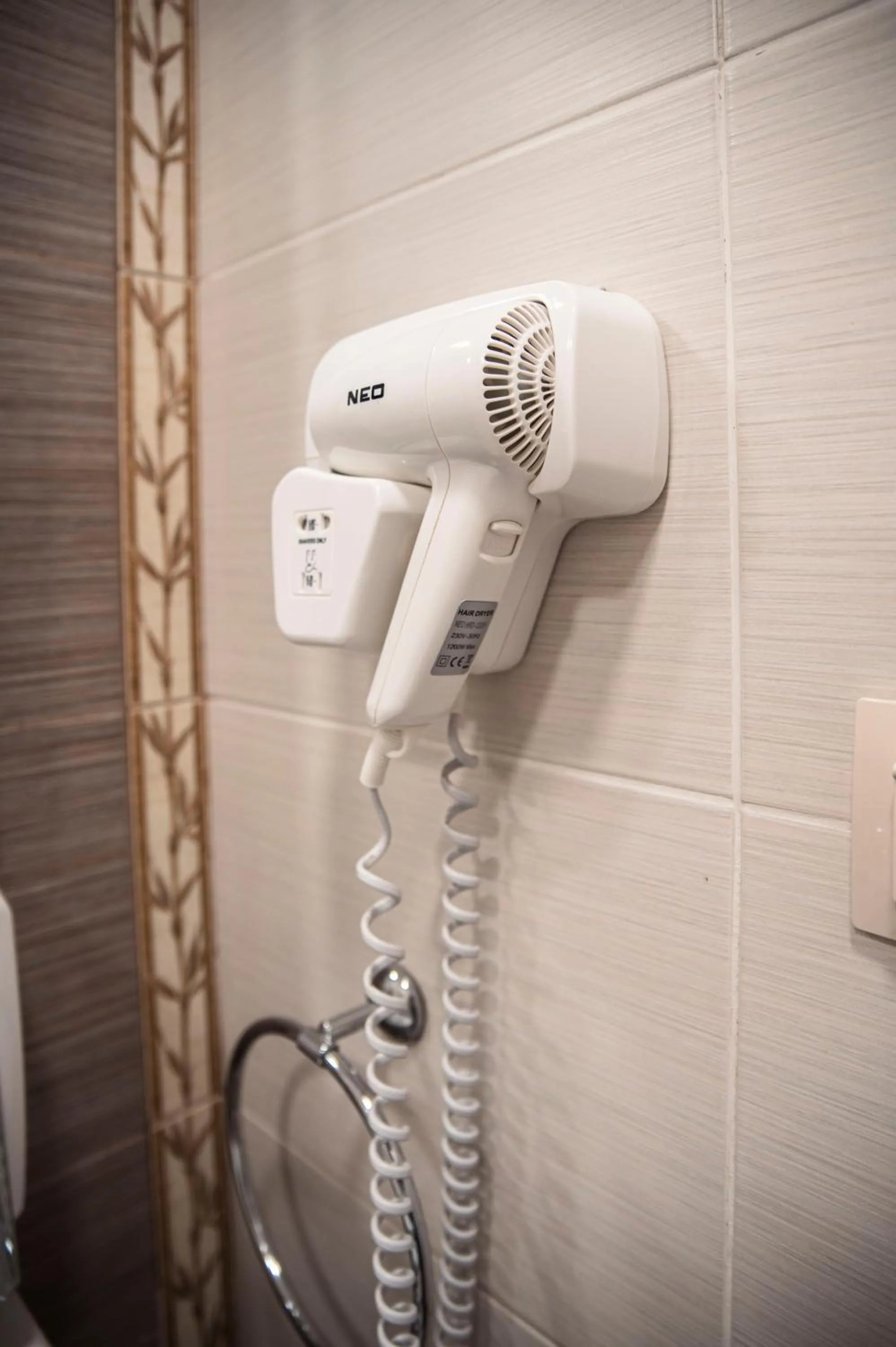 Bathroom in Three Dolphins Hotel with a Rooftop terracе