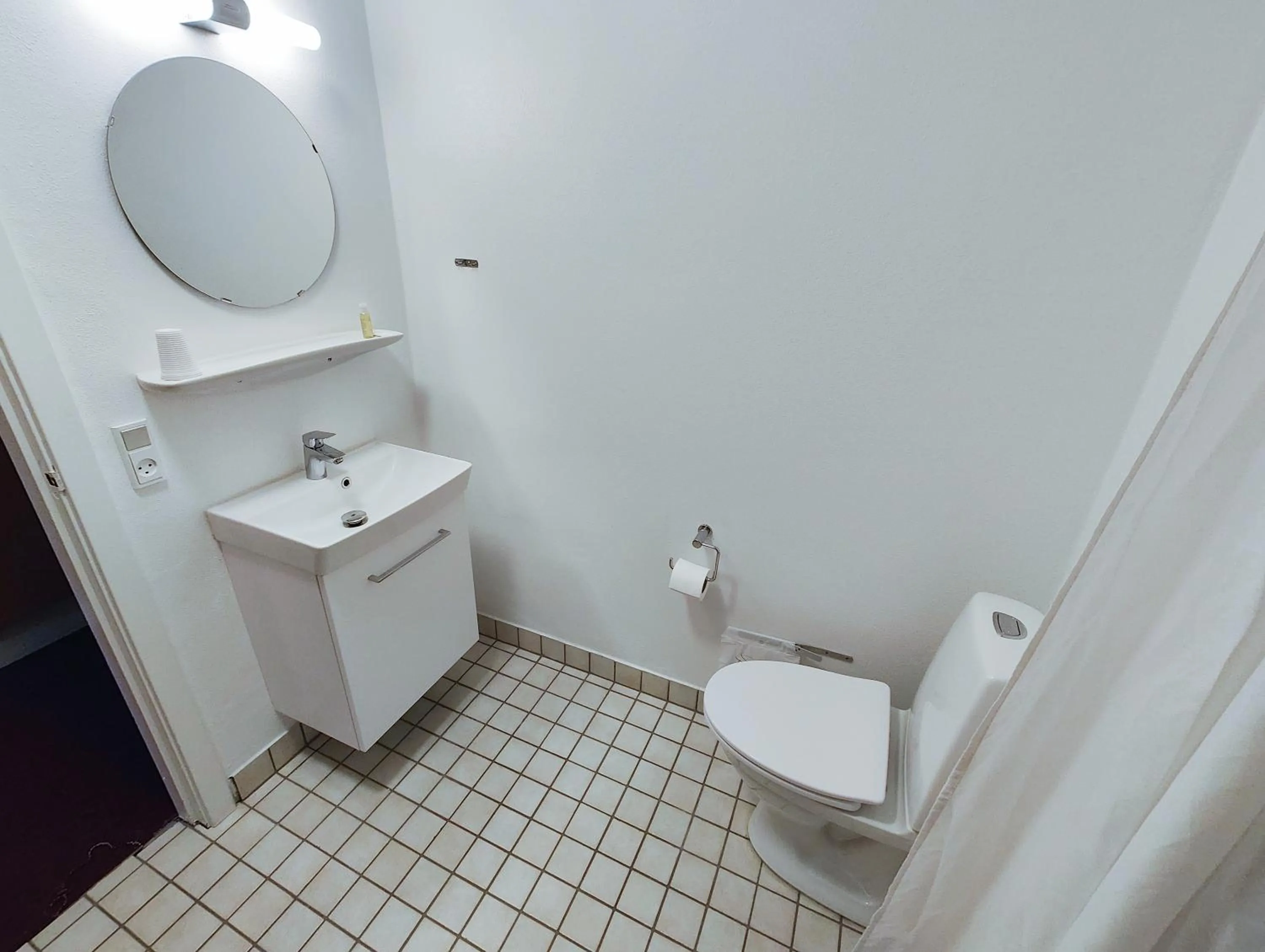 Toilet in Rønnes Hotel