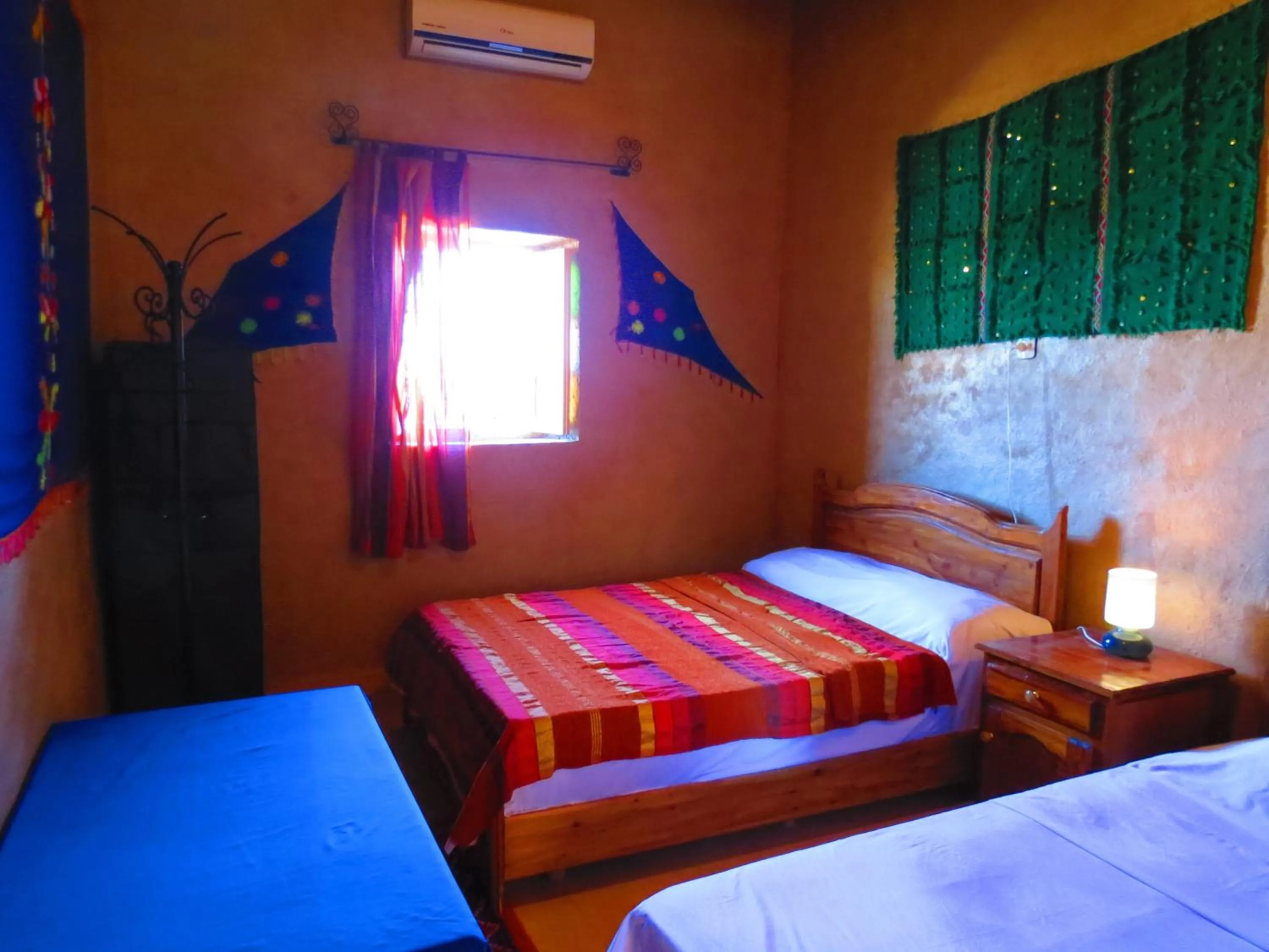 Bed in Hôtel Riad Tadarte Familier