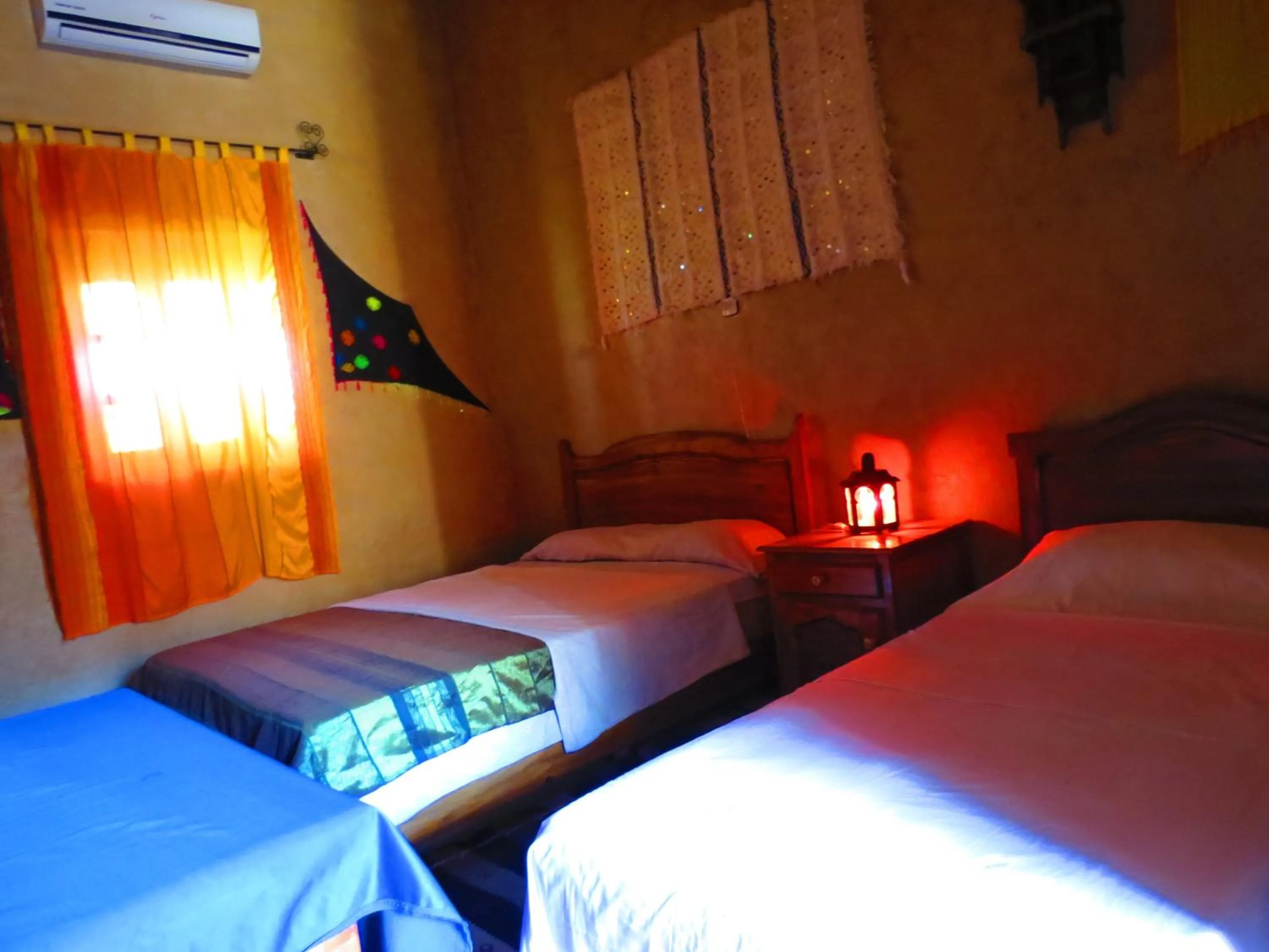 Bed in Hôtel Riad Tadarte Familier