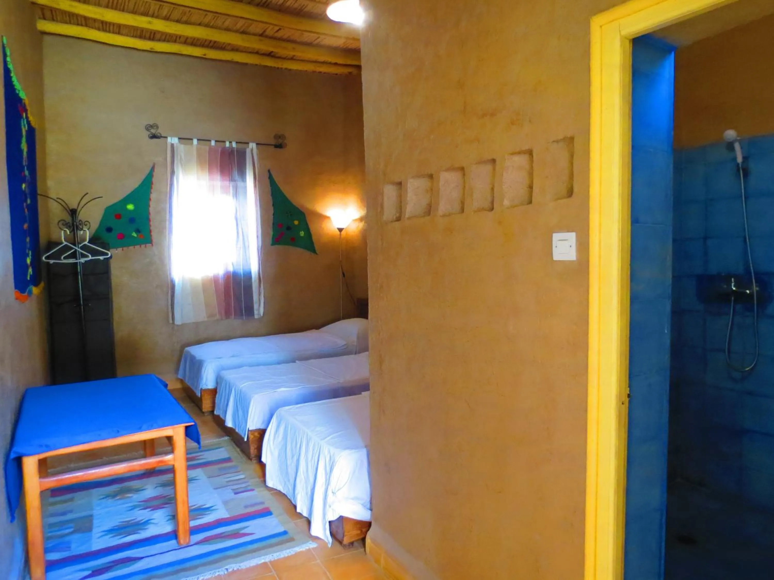 Bed in Hôtel Riad Tadarte Familier