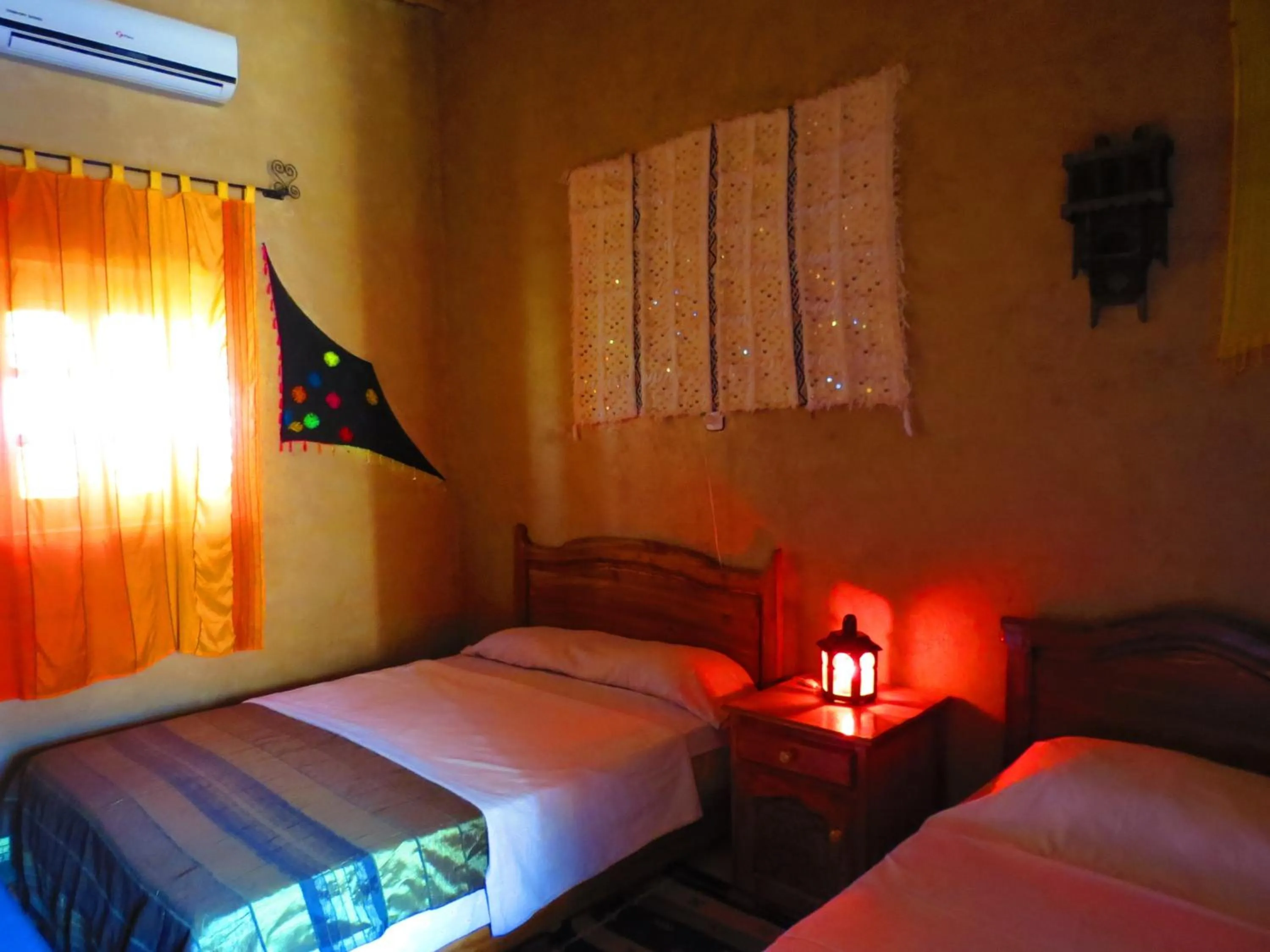 Bed in Hôtel Riad Tadarte Familier