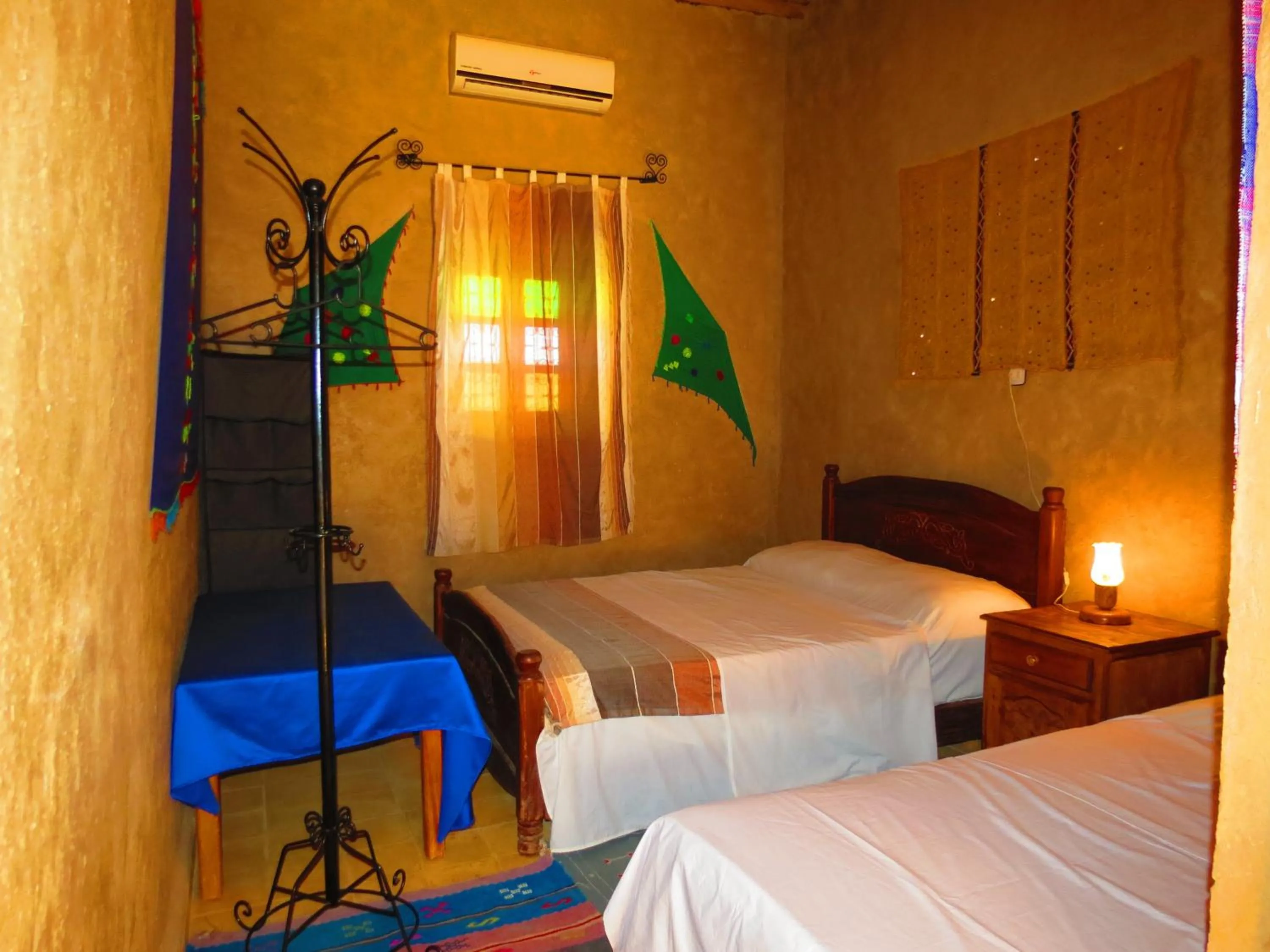 Bed in Hôtel Riad Tadarte Familier