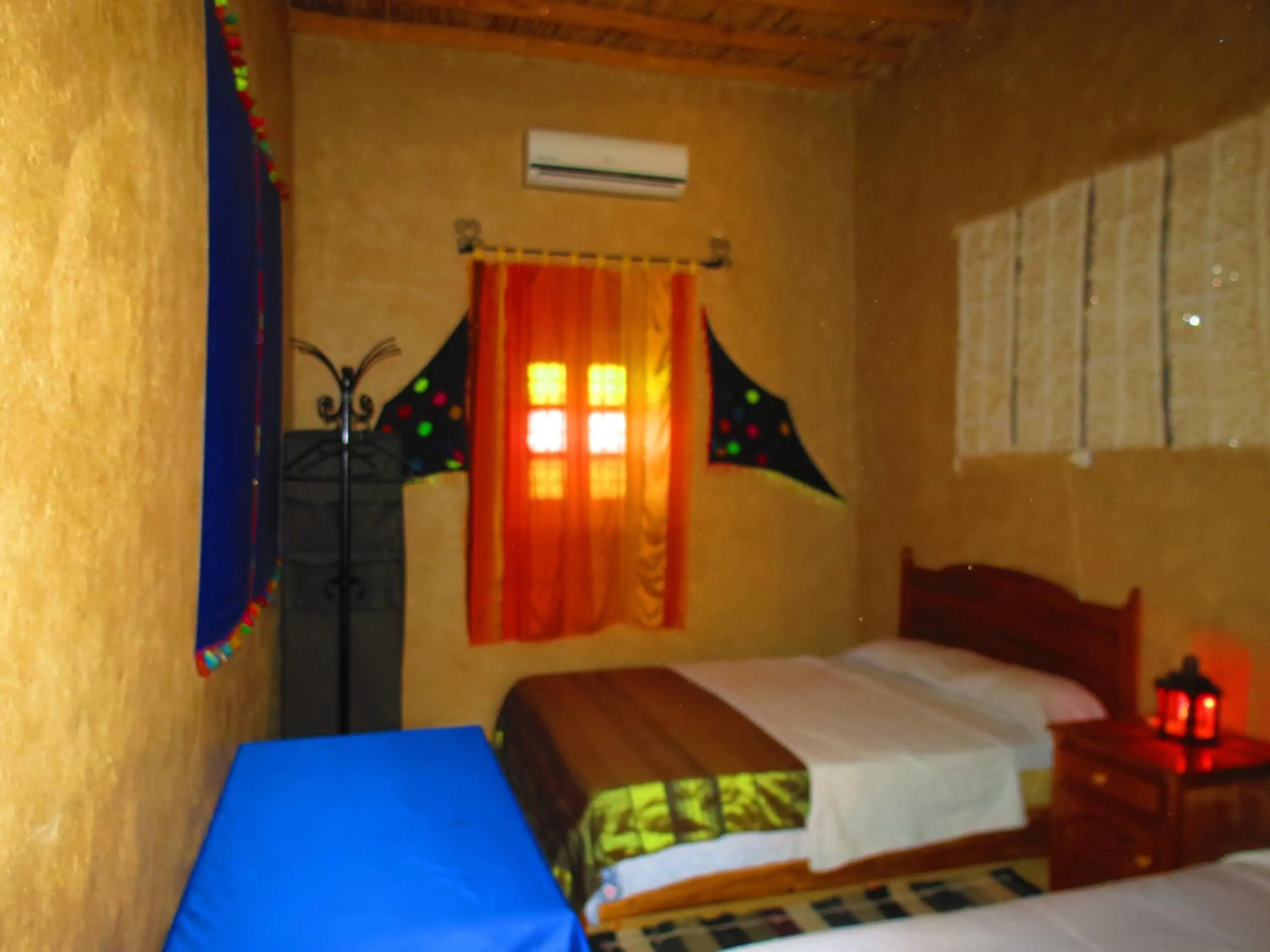 Bed in Hôtel Riad Tadarte Familier