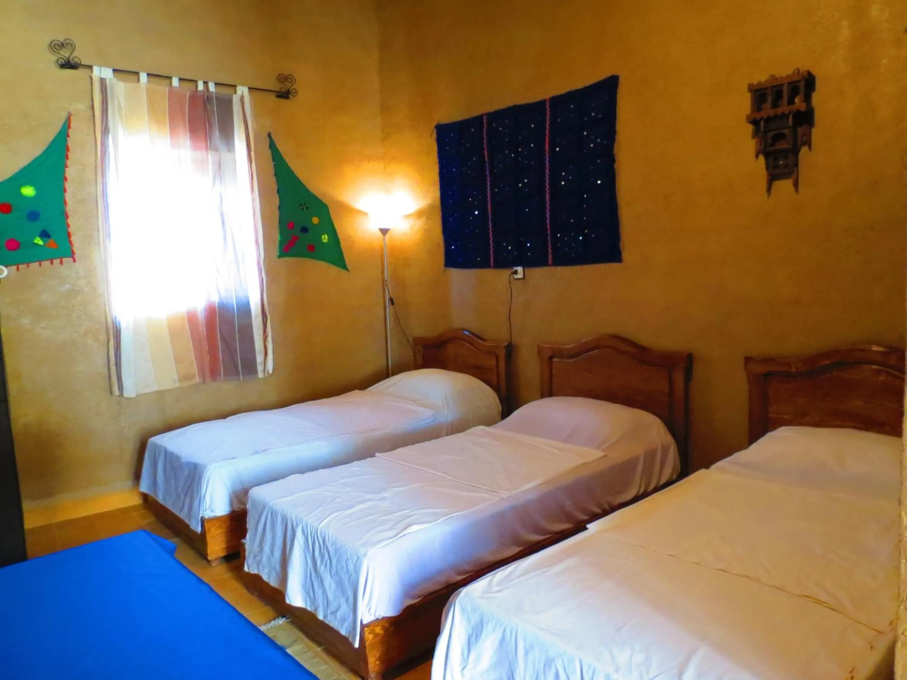 Bed in Hôtel Riad Tadarte Familier