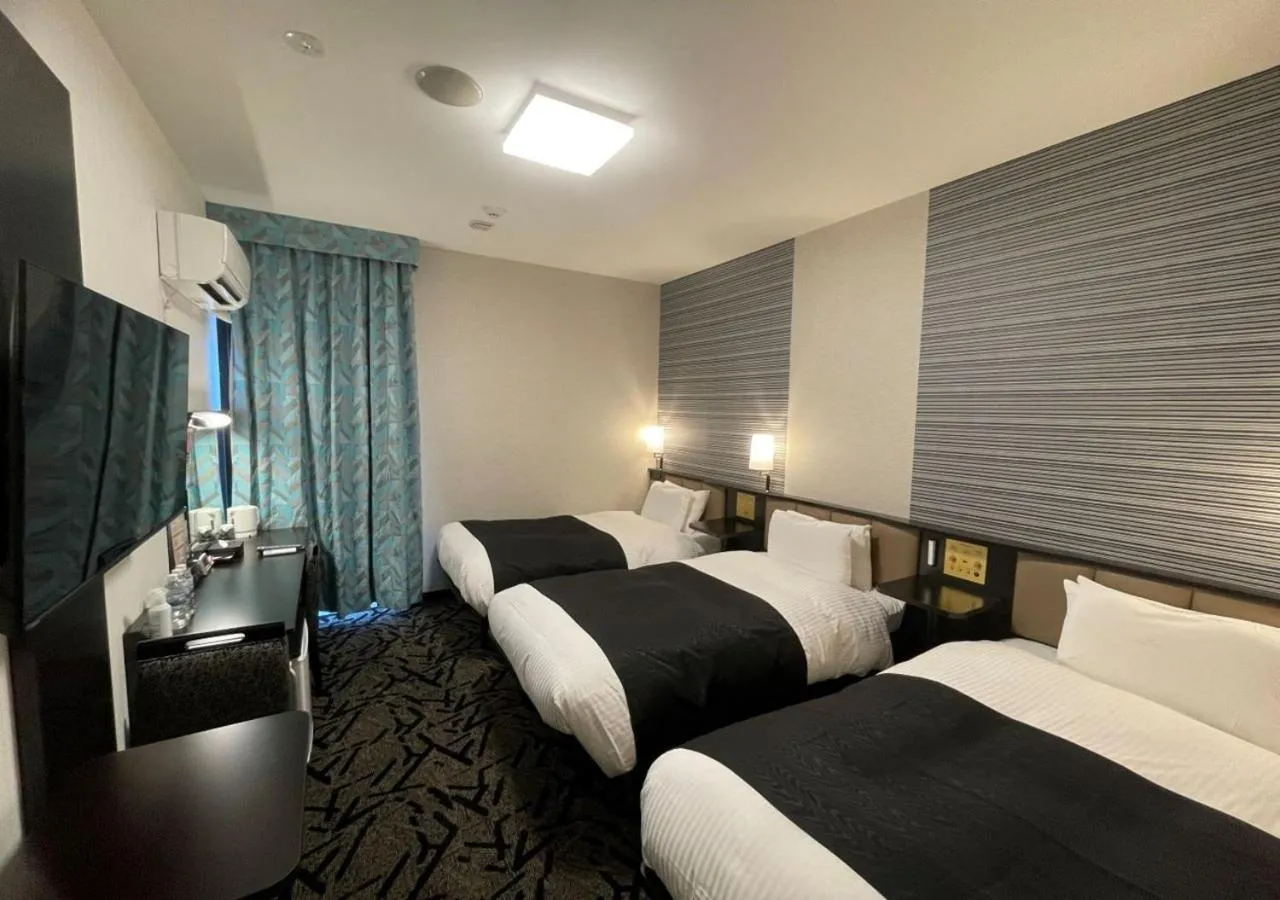Bed in APA Hotel Ishigakijima