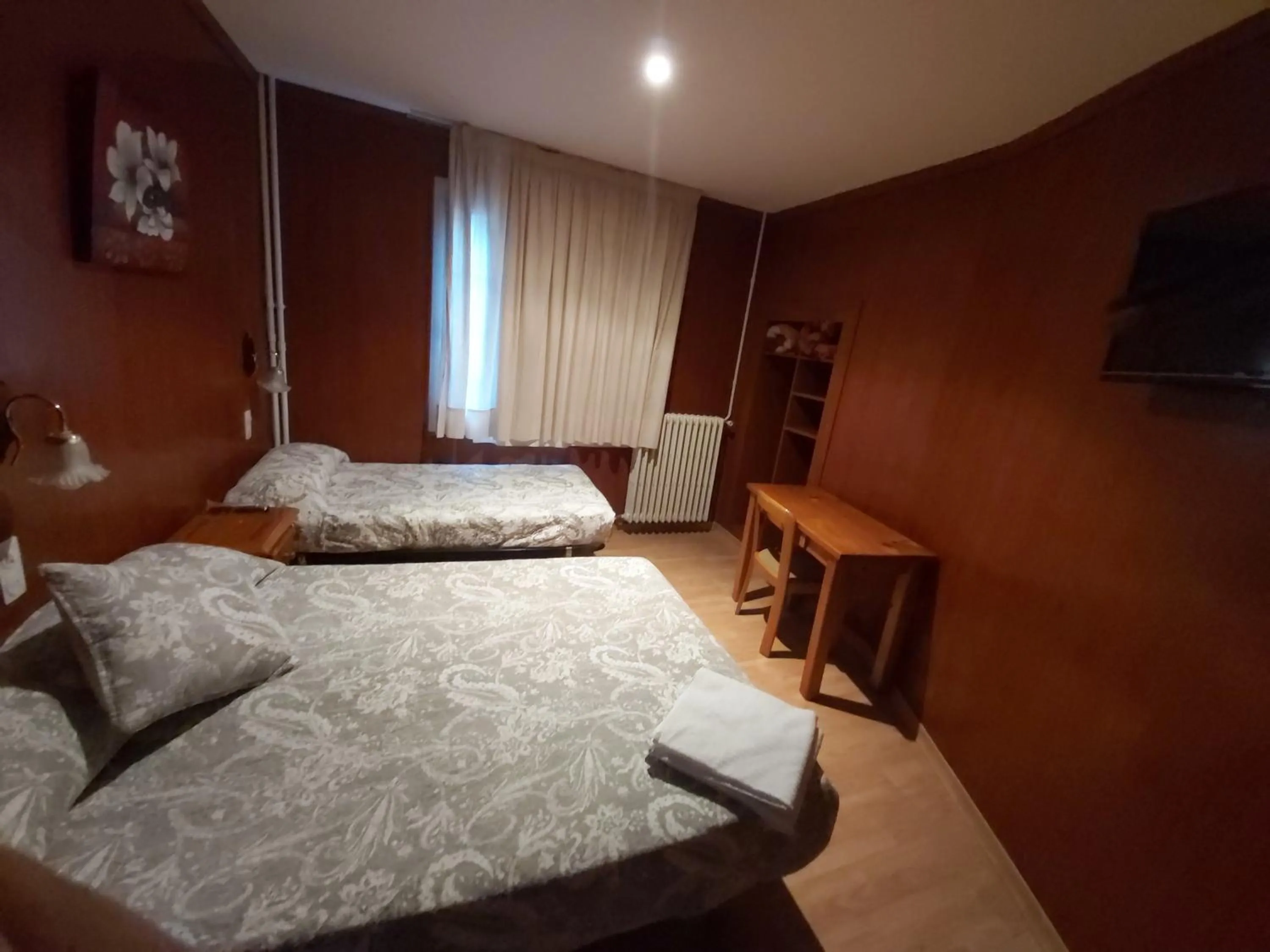 Property building, Bed in Hostal Porta De Núria