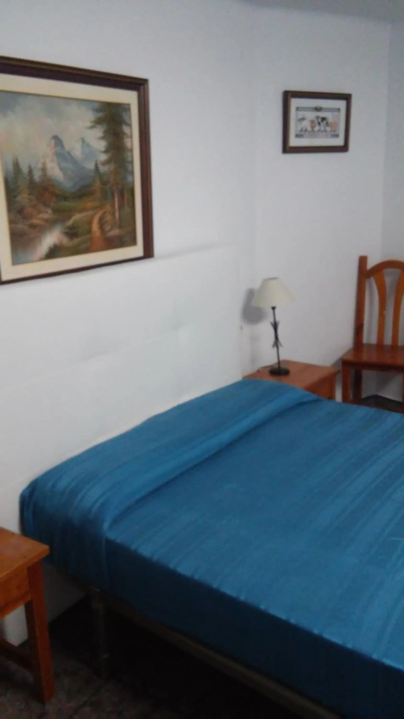 Photo of the whole room, Bed in Hostal Porta De Núria