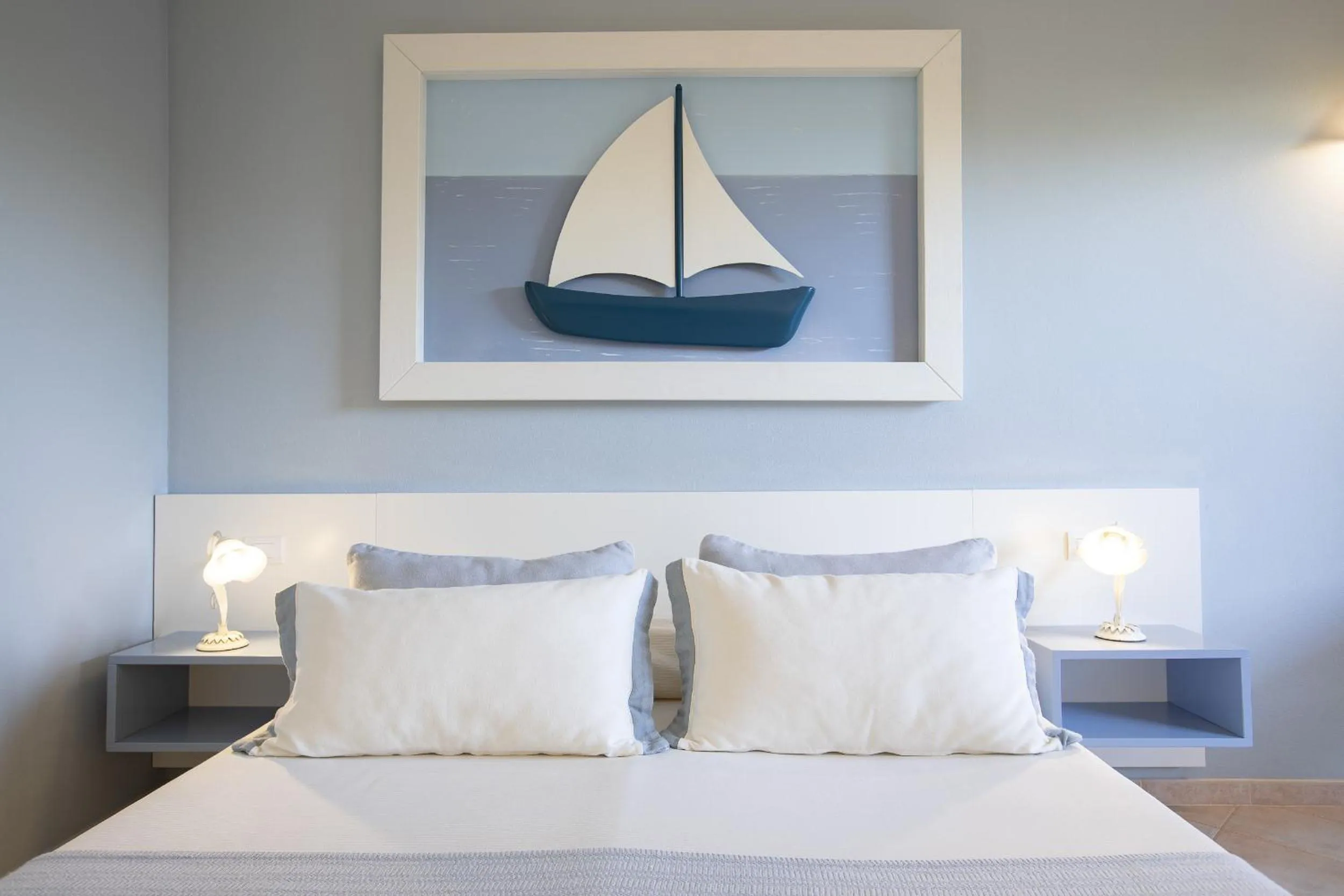 Bed in Hotel Baia di Nora