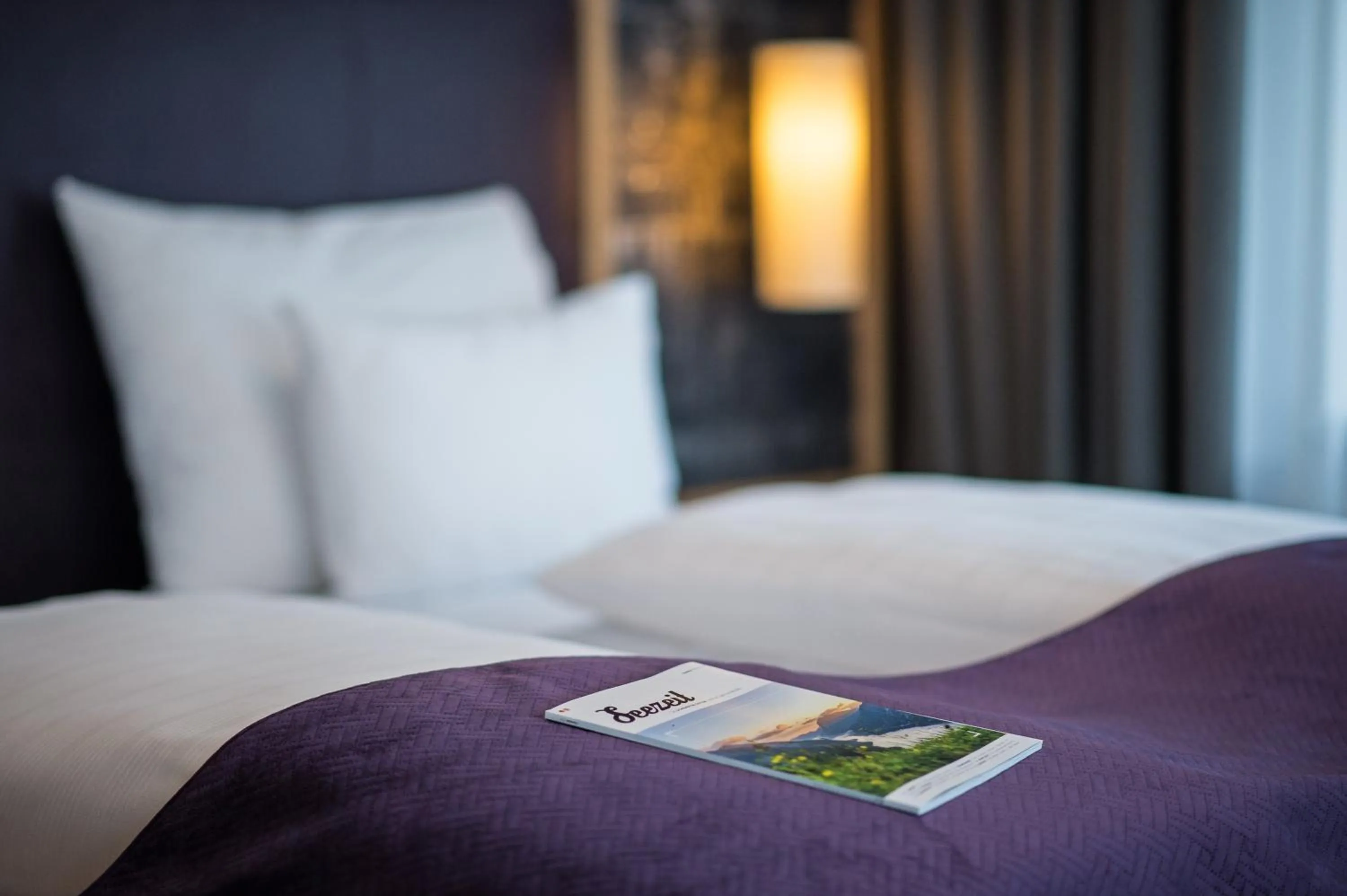 Bed in Arthur's Hotel und Apartments am Achensee