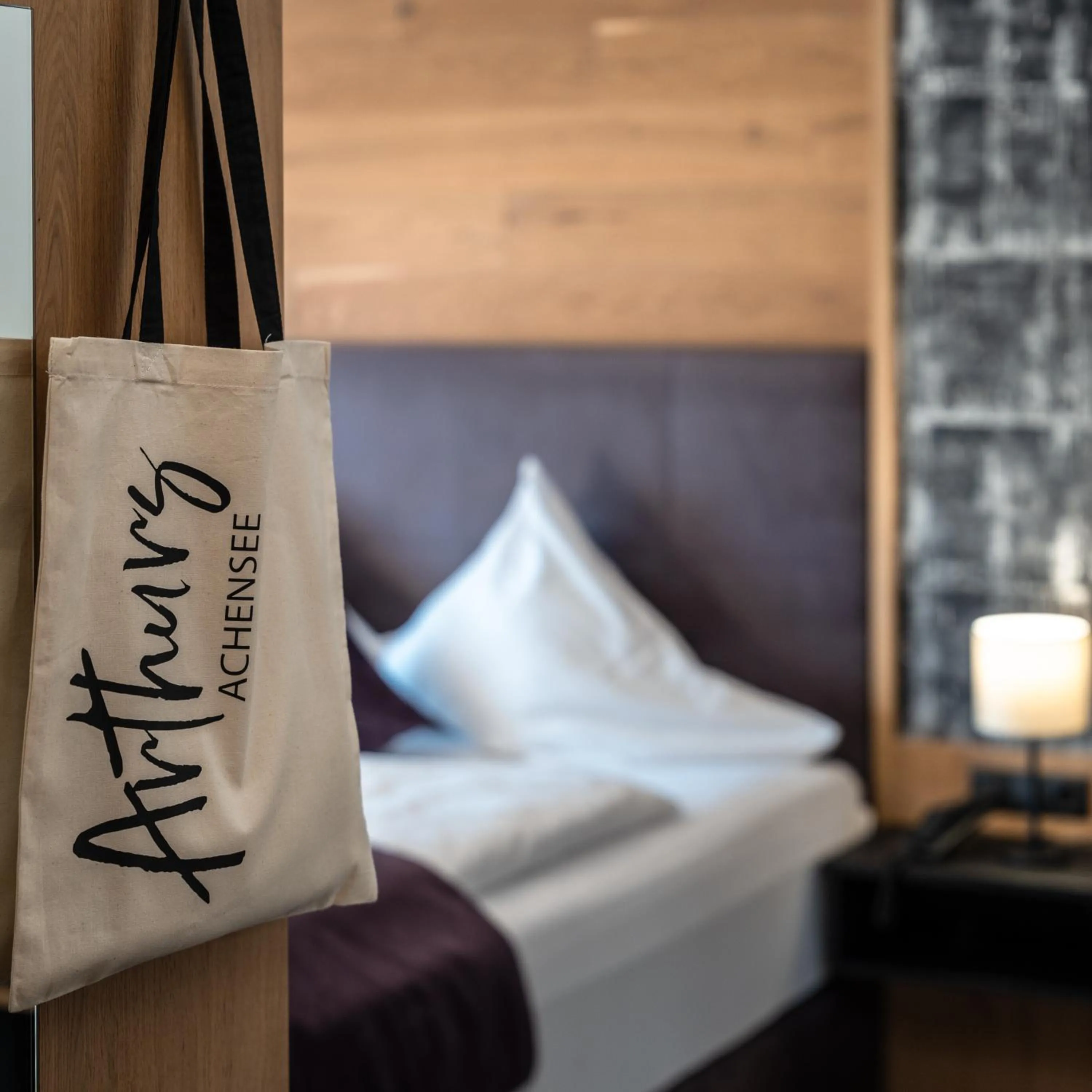 Bed in Arthur's Hotel und Apartments am Achensee