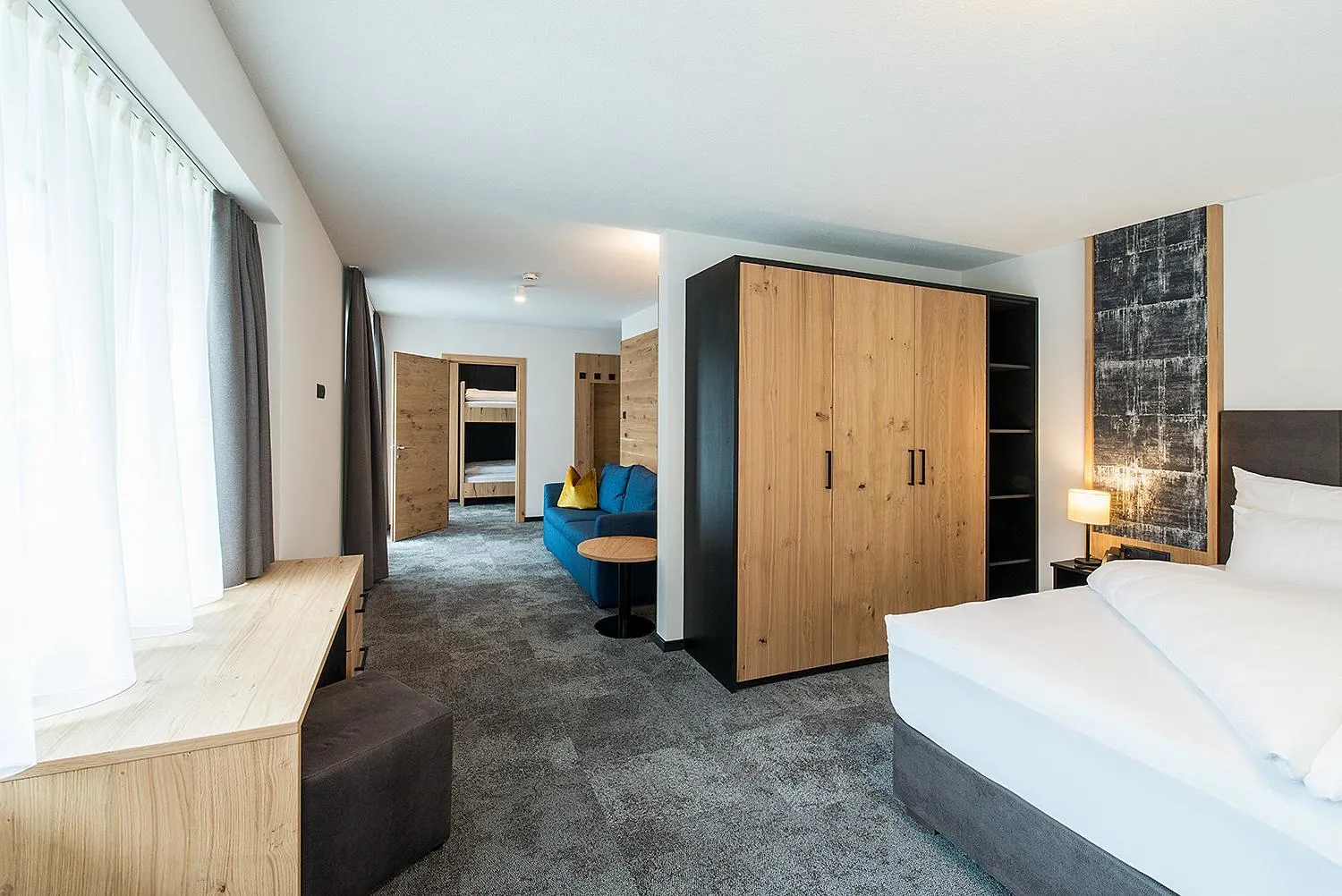 Bed in Arthur's Hotel und Apartments am Achensee