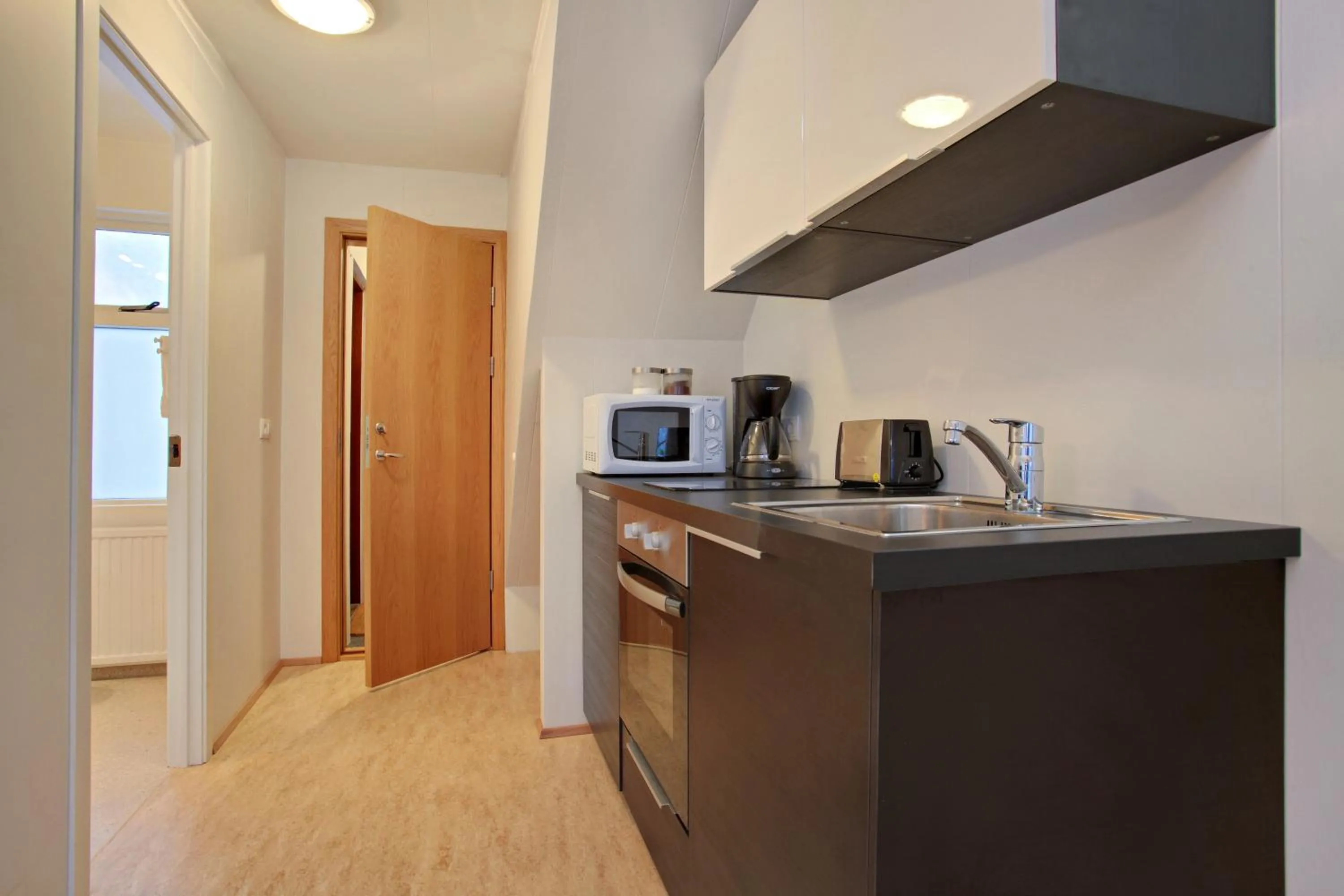 Kitchen or kitchenette in Alfred's Apartments