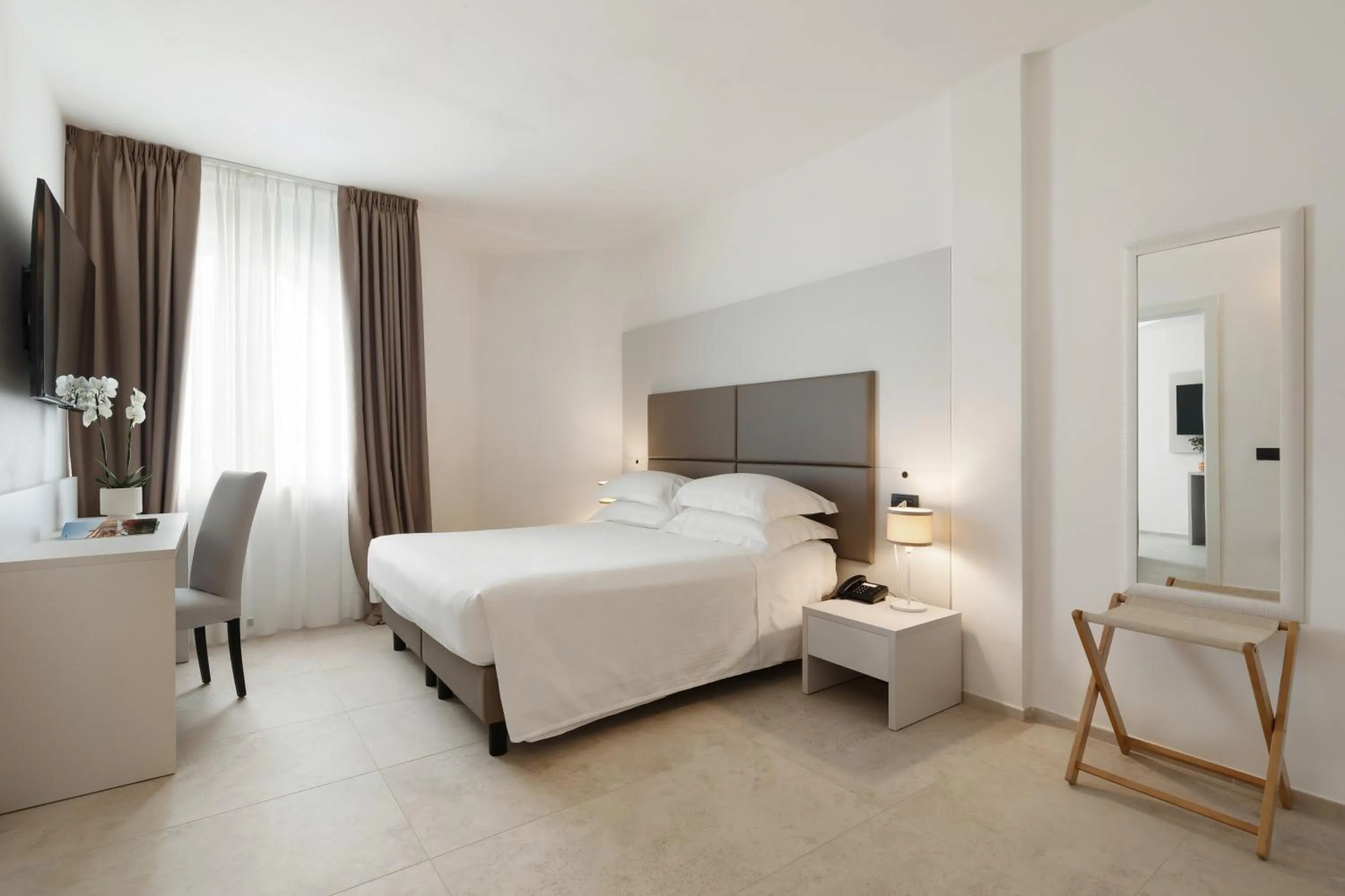 Bedroom in Hotel Villa Domizia