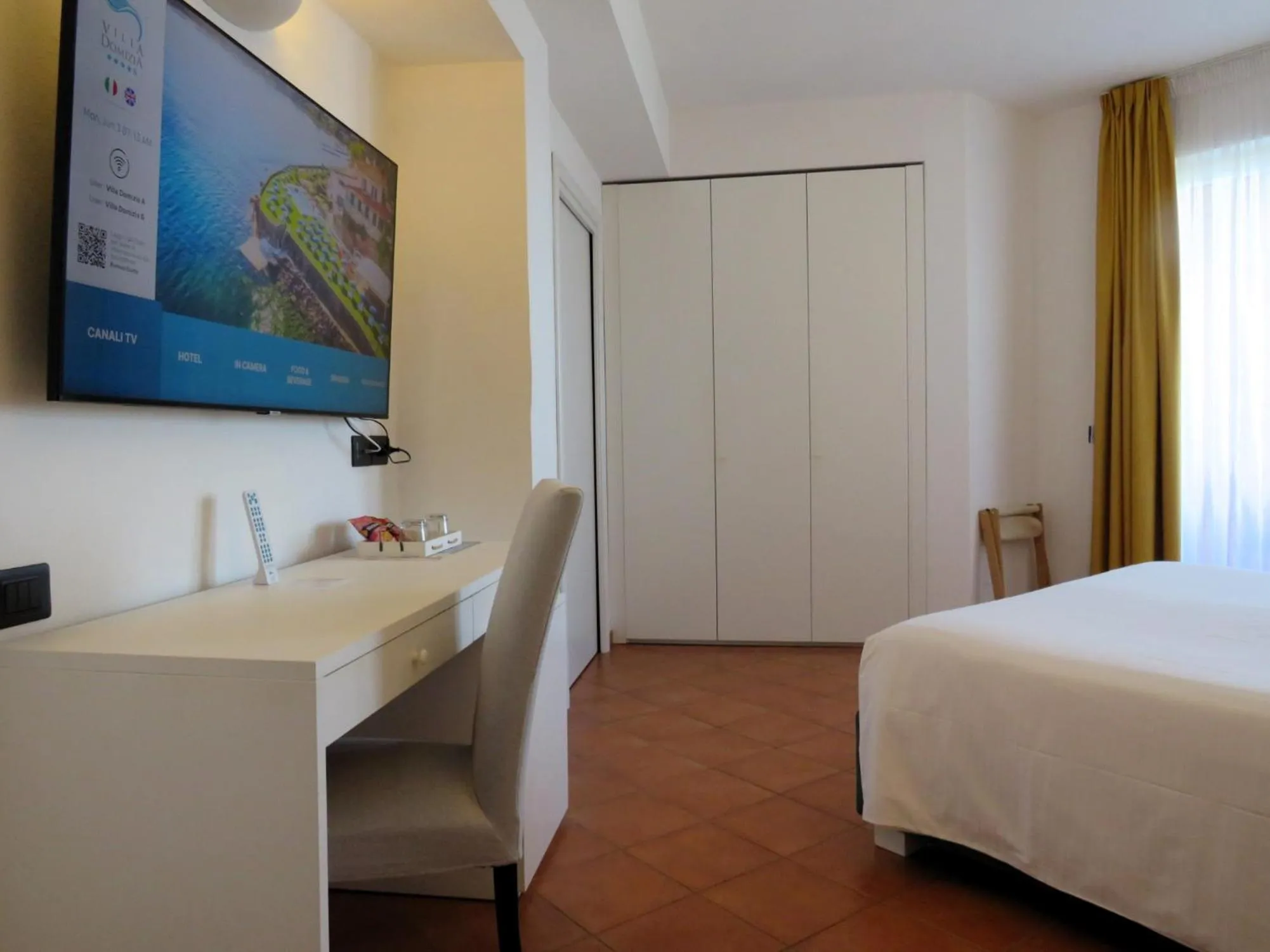 Bedroom in Hotel Villa Domizia