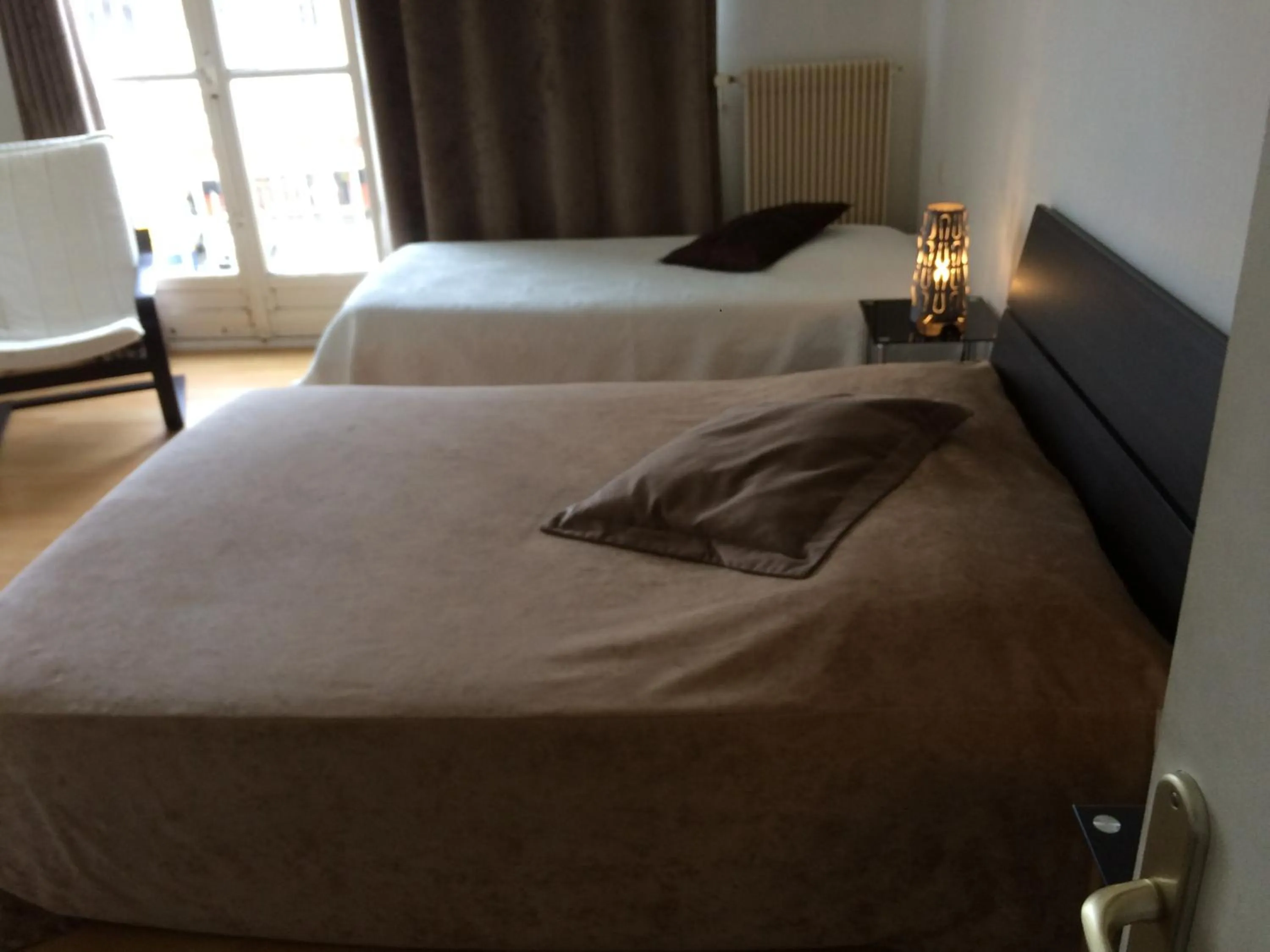 Bed in Hôtel de la poste