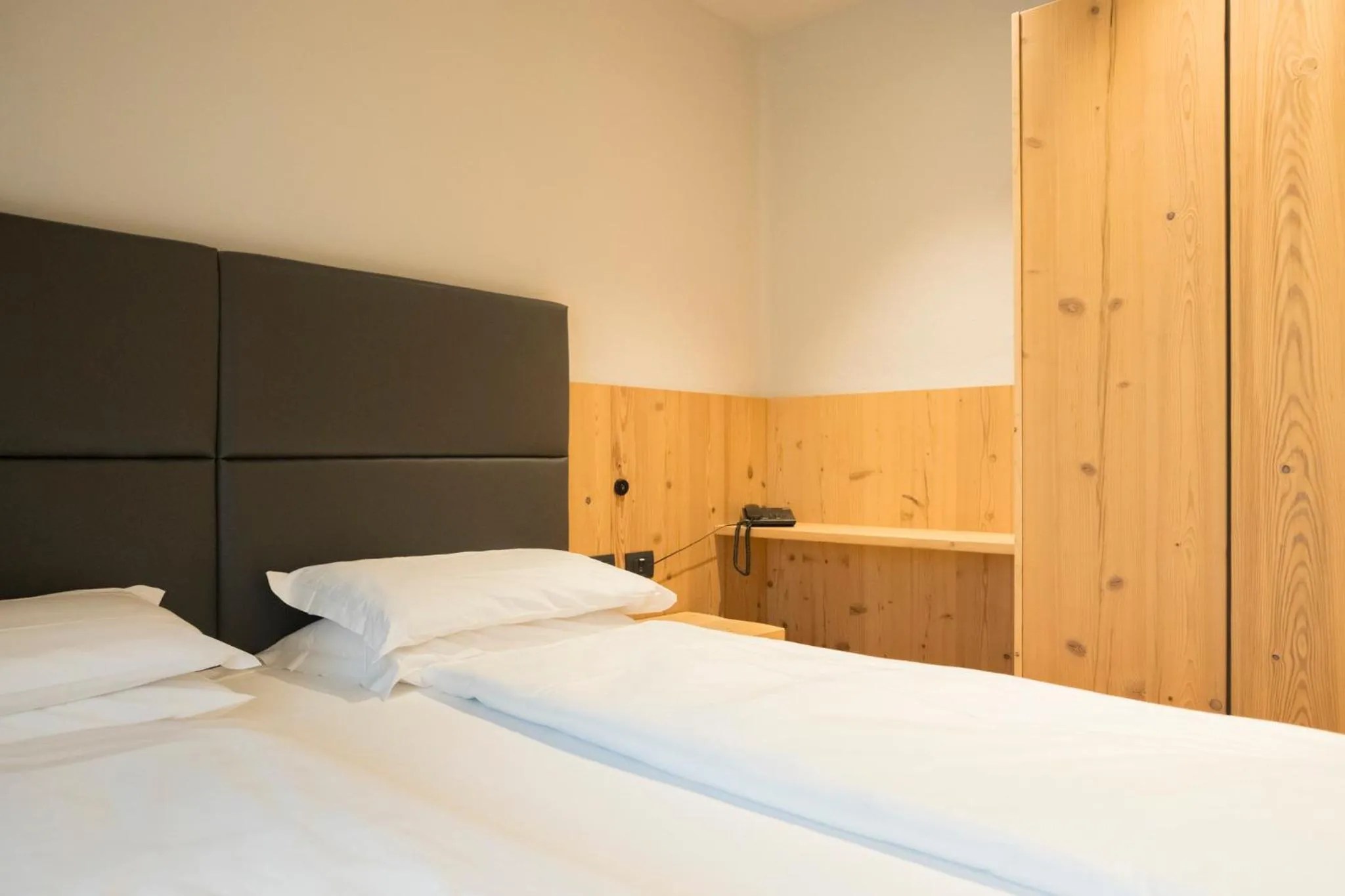 Bed in Hotel La Montanara Predazzo