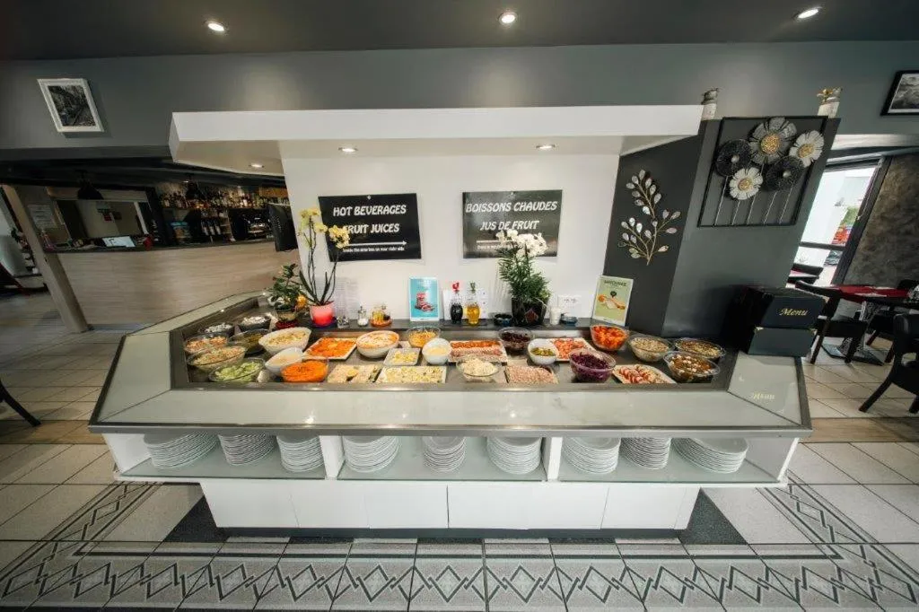 Buffet breakfast in Brit Hotel La Bonne Etape