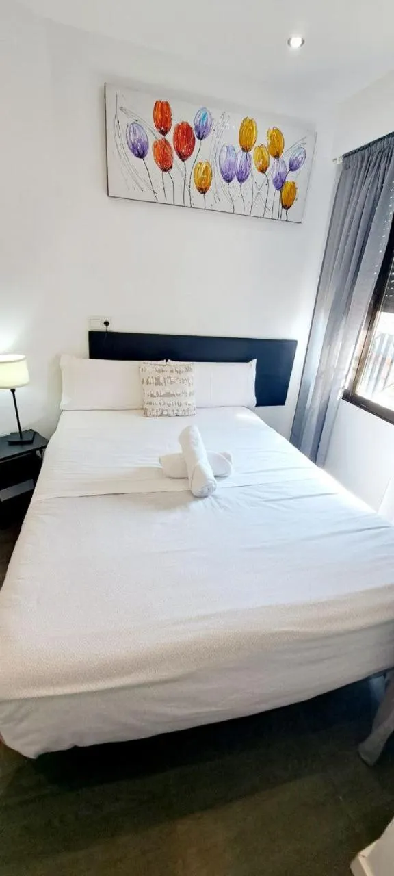 Bed in AYZ Ulises - Auto check-in property