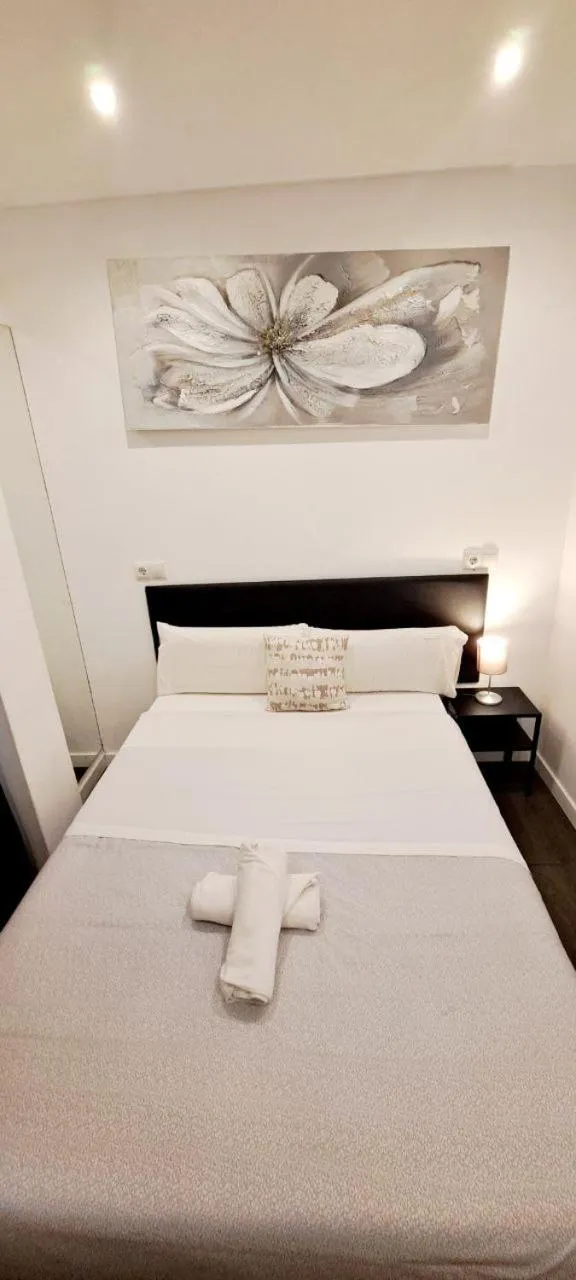 Bed in AYZ Ulises - Auto check-in property