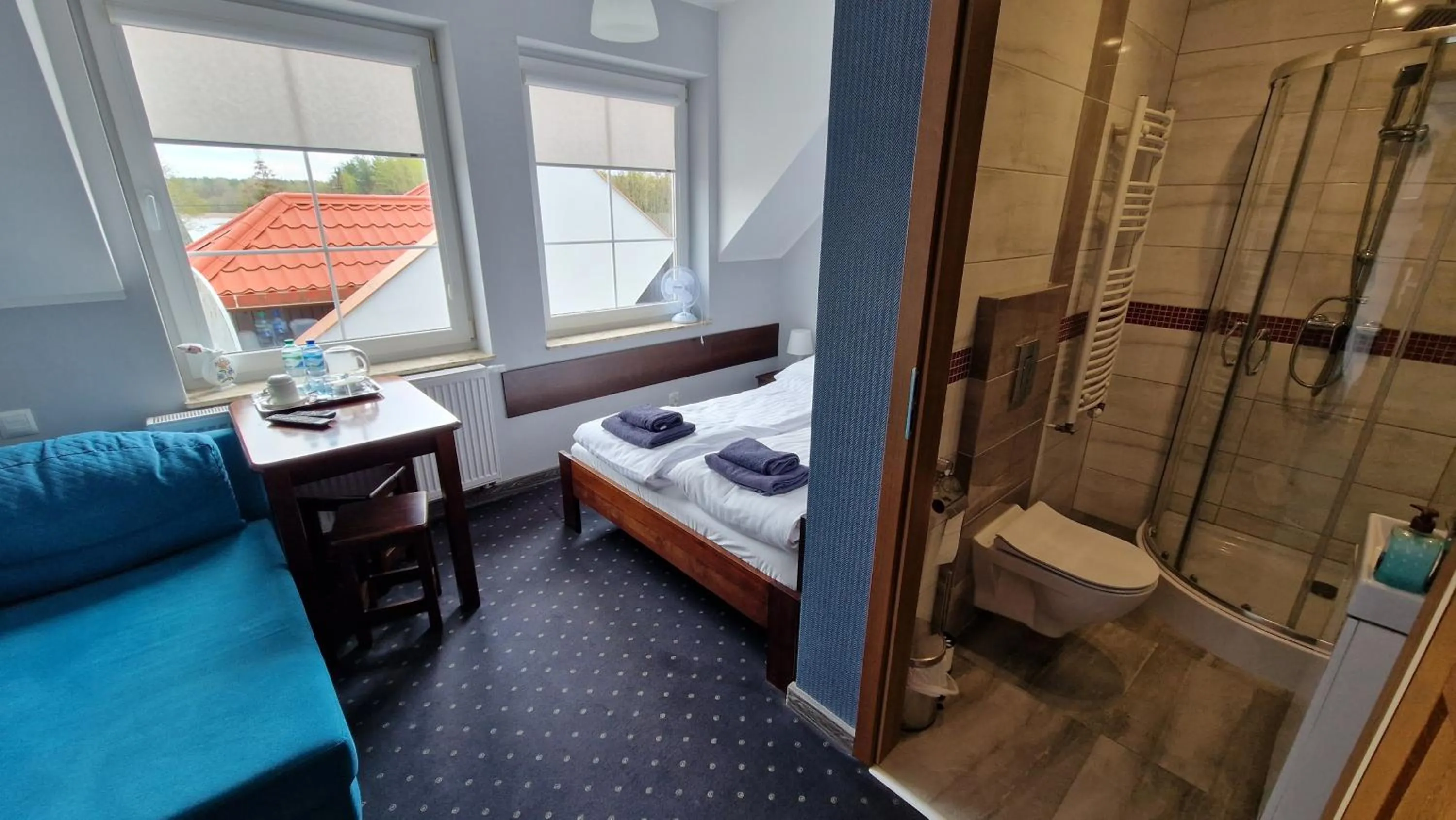 Shower, Bed in PHU Gościniec "16-tka" Katarzyna Zdrojewska