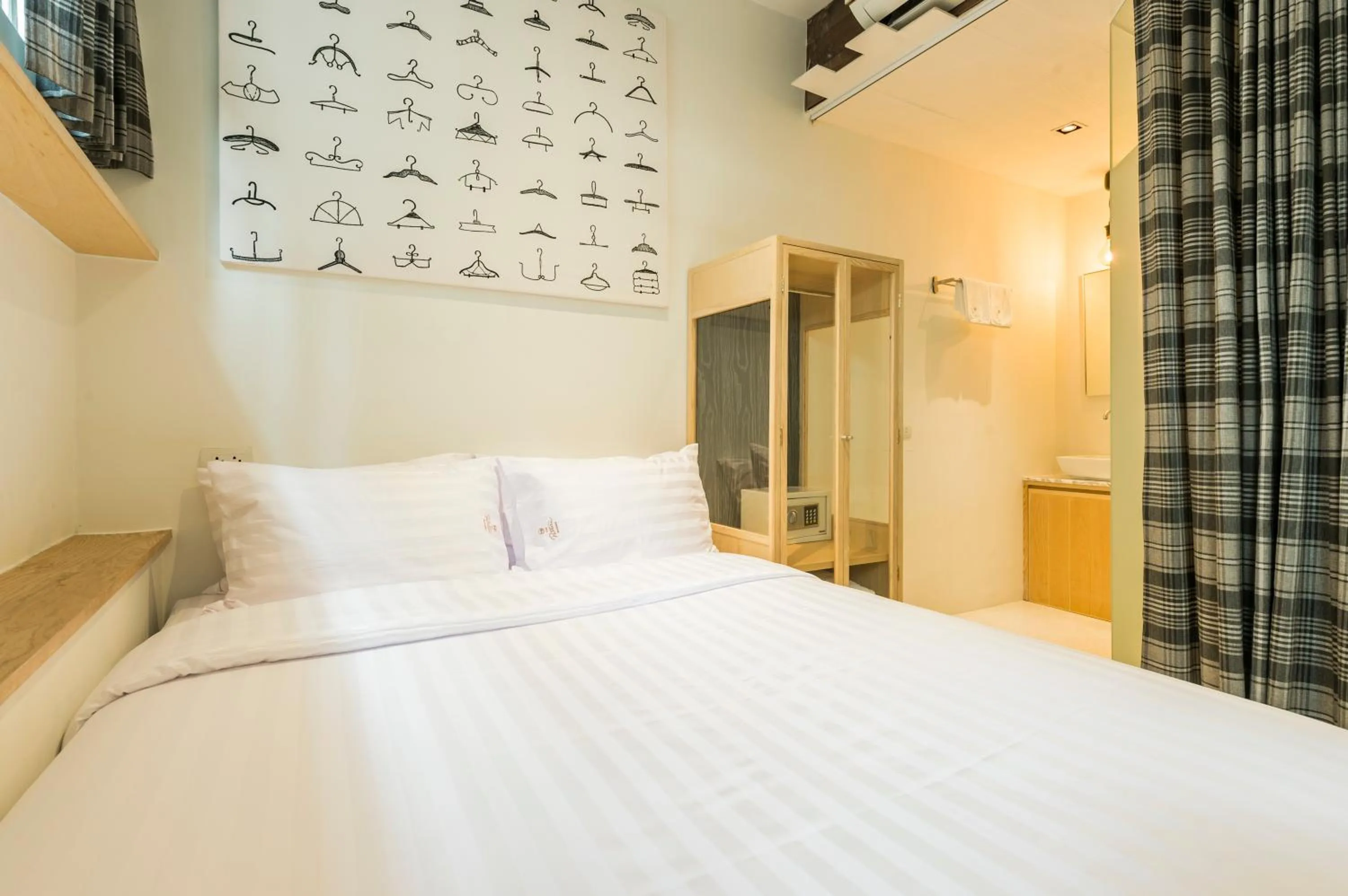 Bed in The Pattern Boutique Hotel