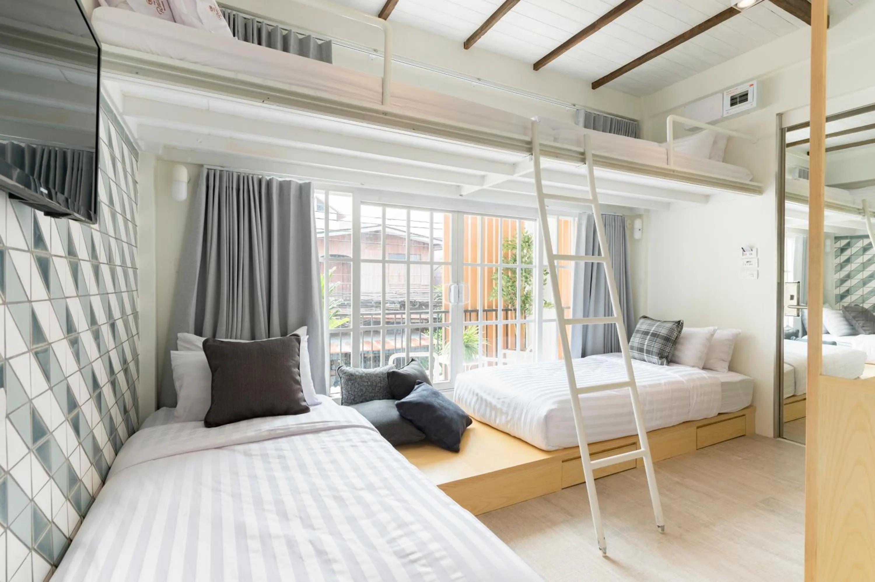 Bed in The Pattern Boutique Hotel