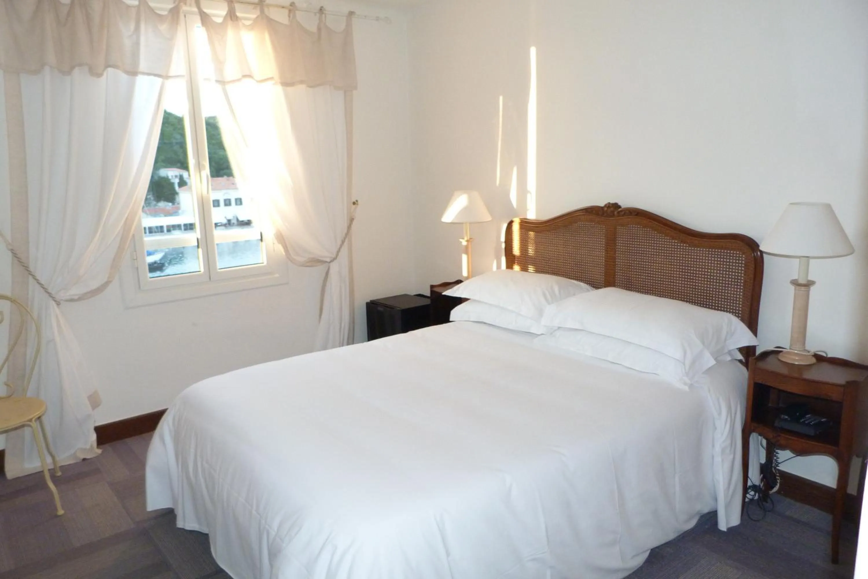 Bedroom in Hotel la Caravelle
