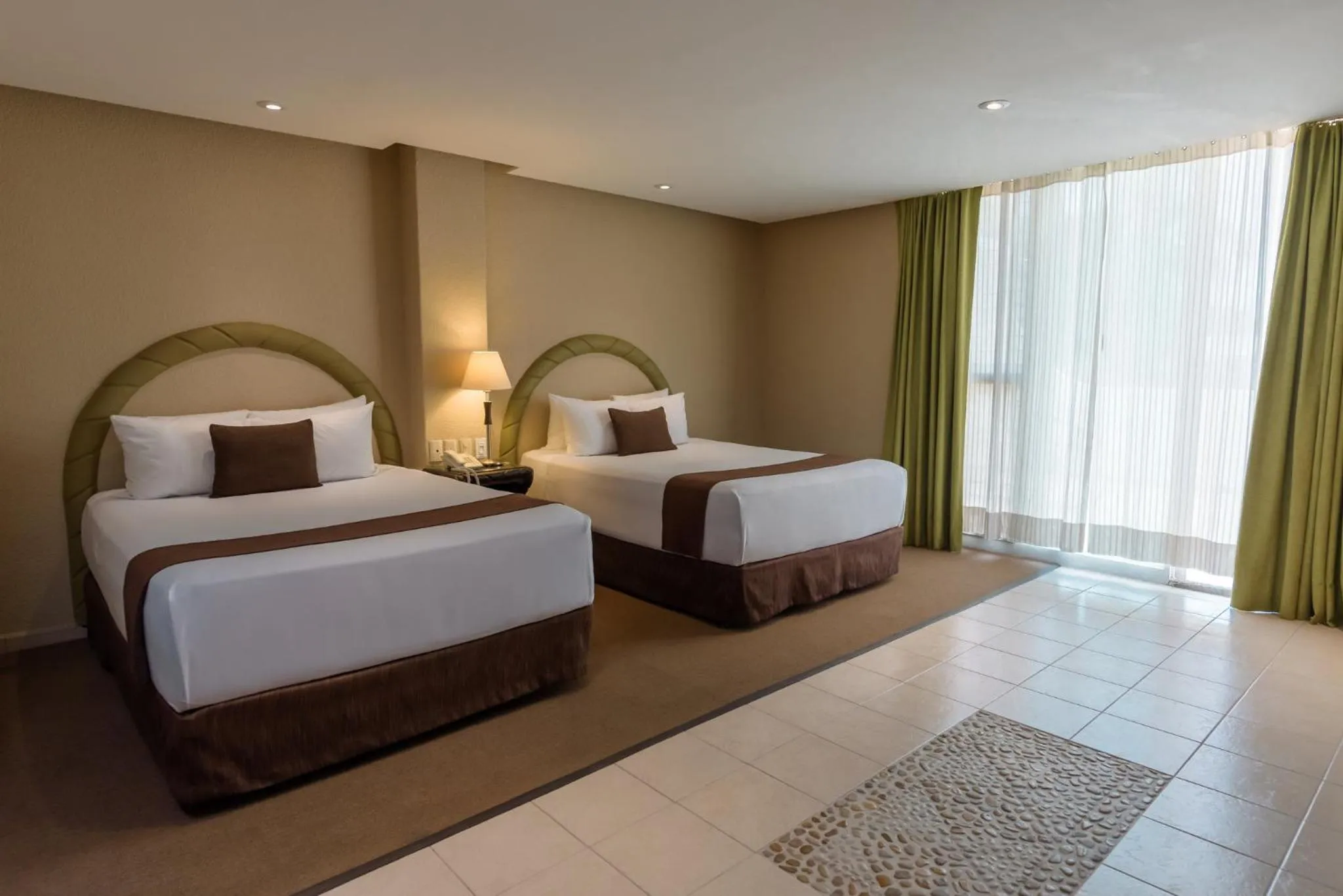 Photo of the whole room, Bed in Gamma Cuernavaca Puerta Paraiso