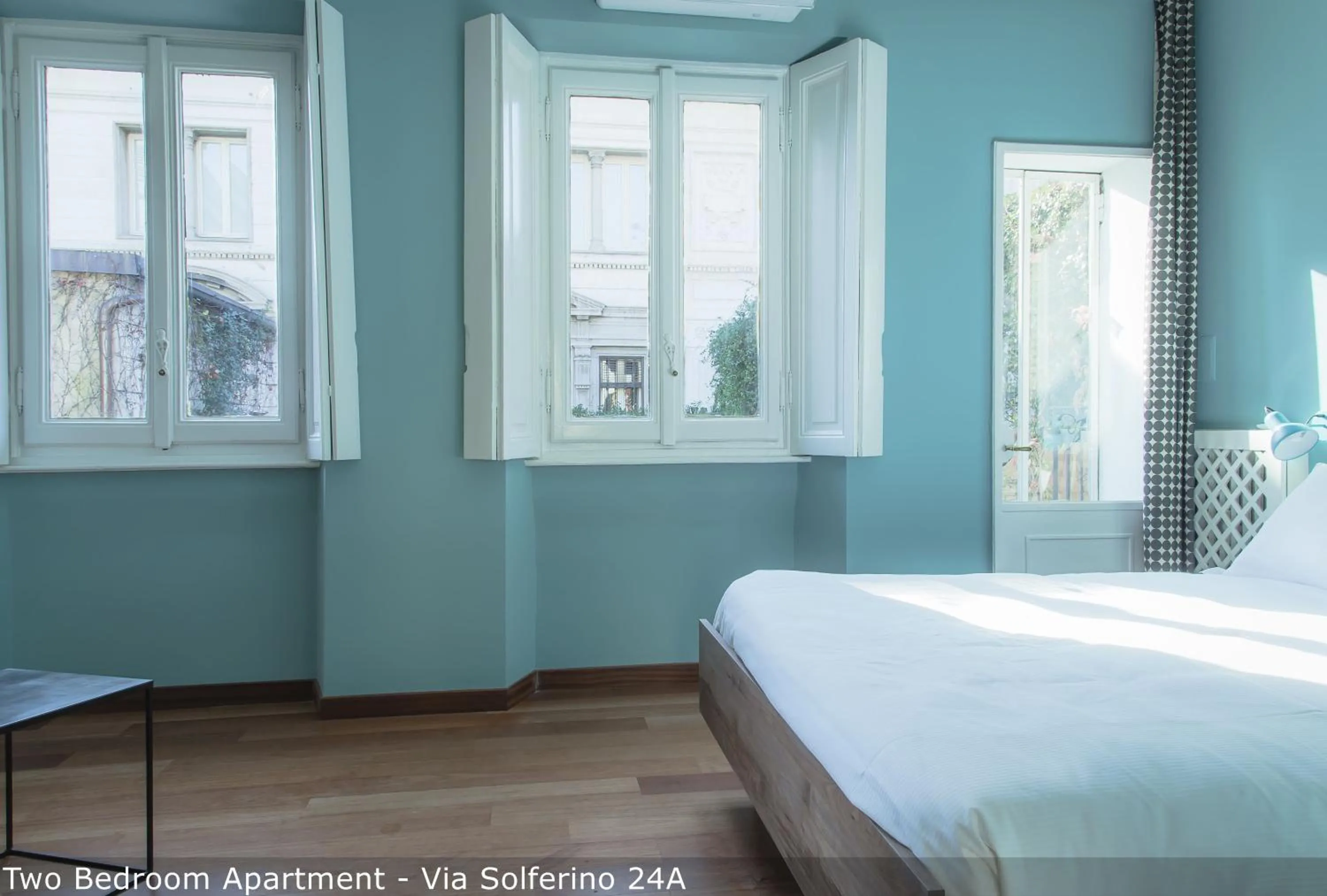 Bed in Brera Apartments in San Marco