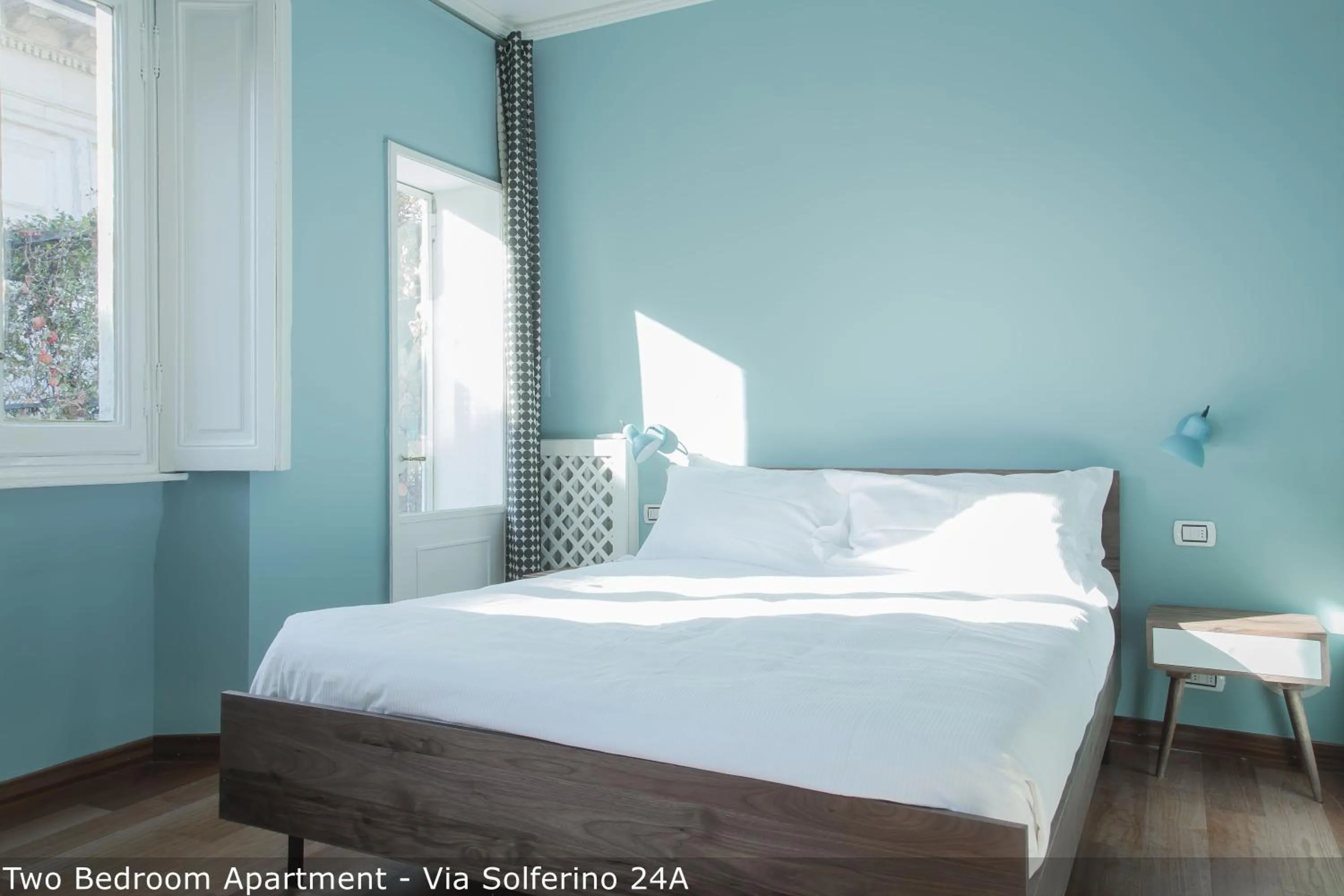 Bed in Brera Apartments in San Marco