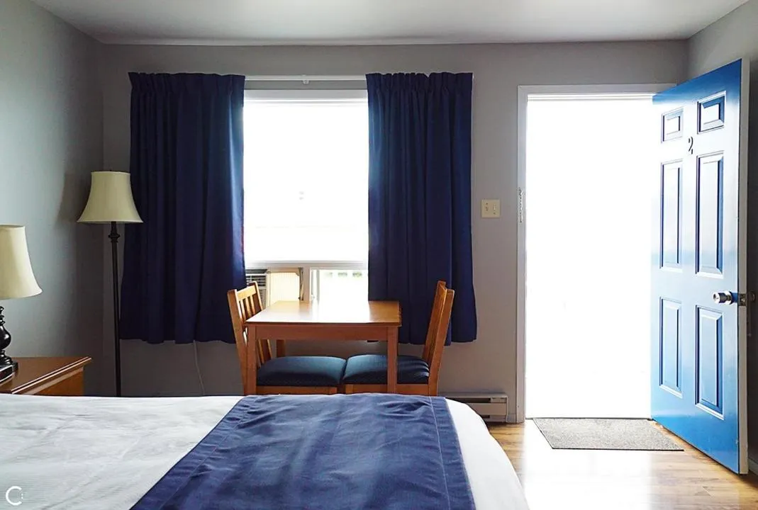 Bed in Hotel-Motel Fleur de Lys