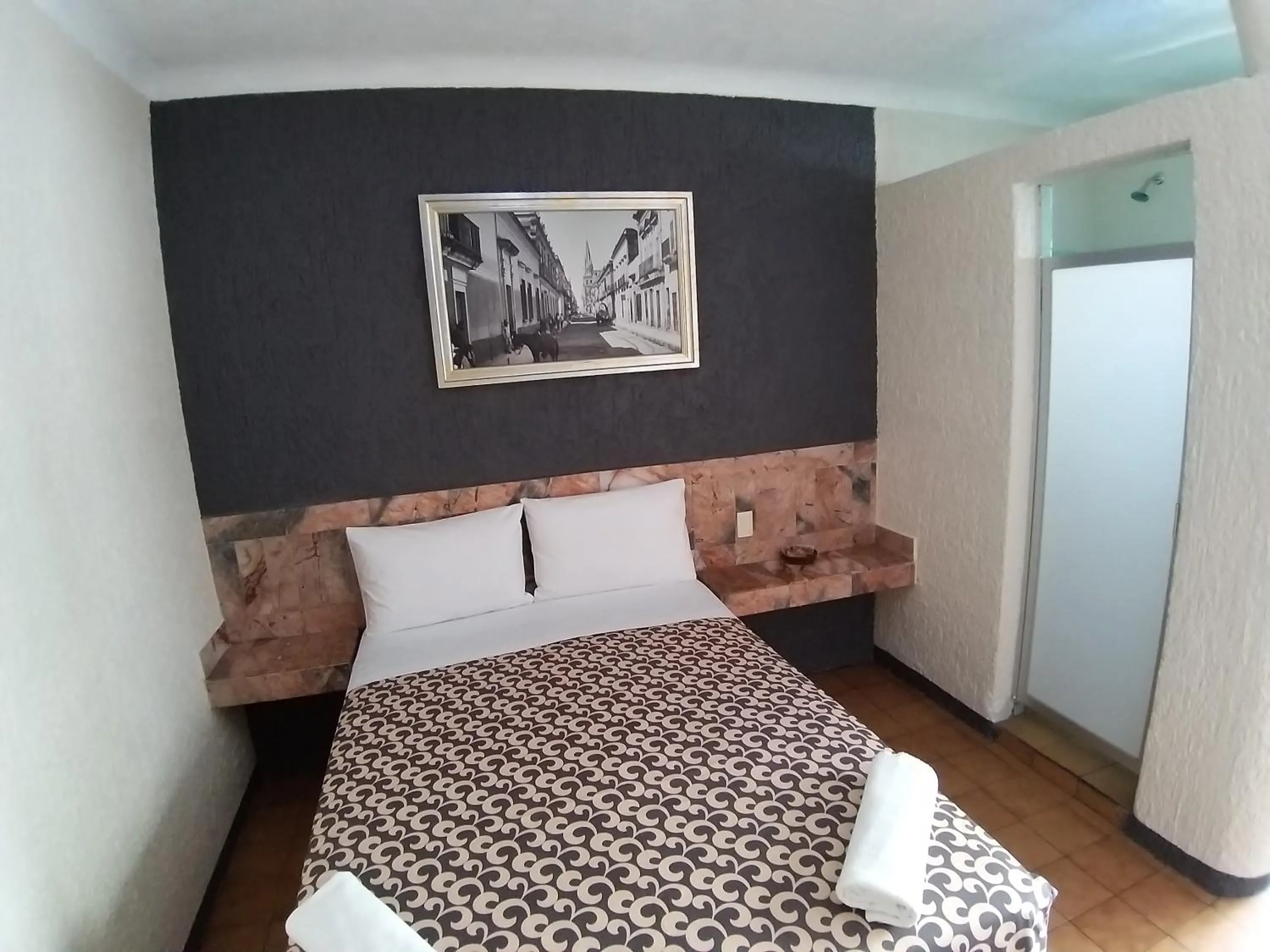 Bed in Hotel Aguila