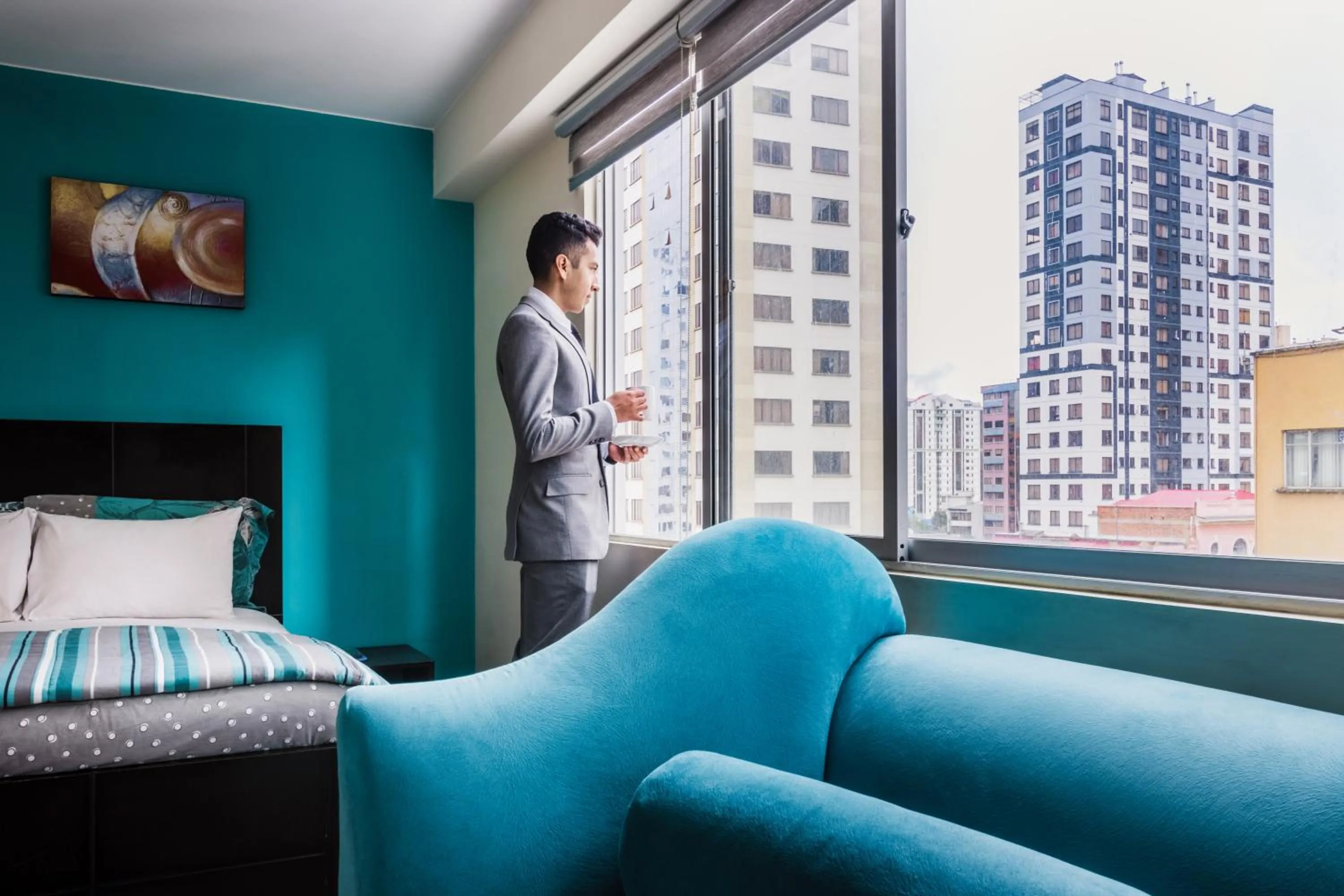 Bedroom in Luxstone Executive & Suites