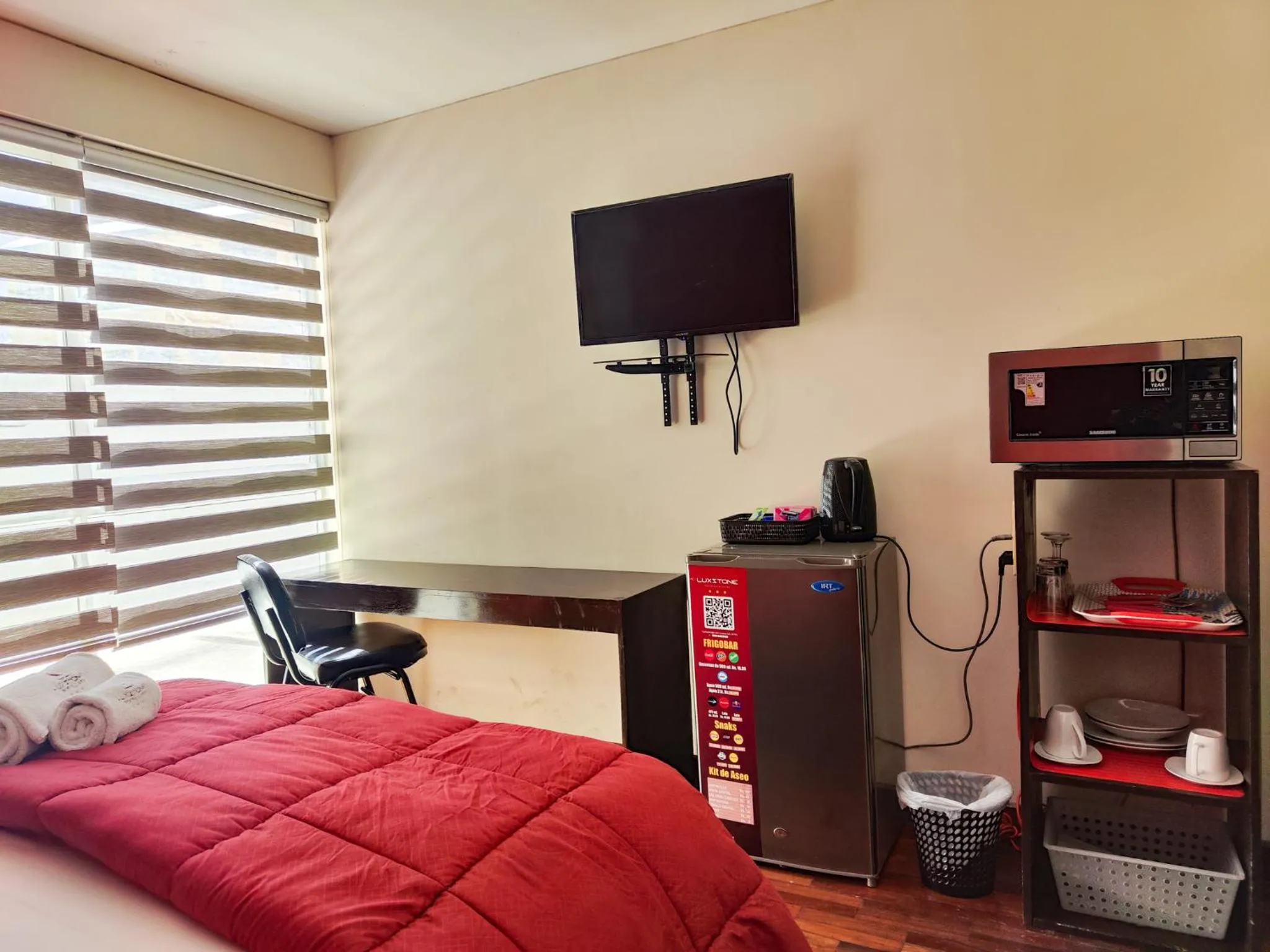 Bed in Luxstone Executive & Suites