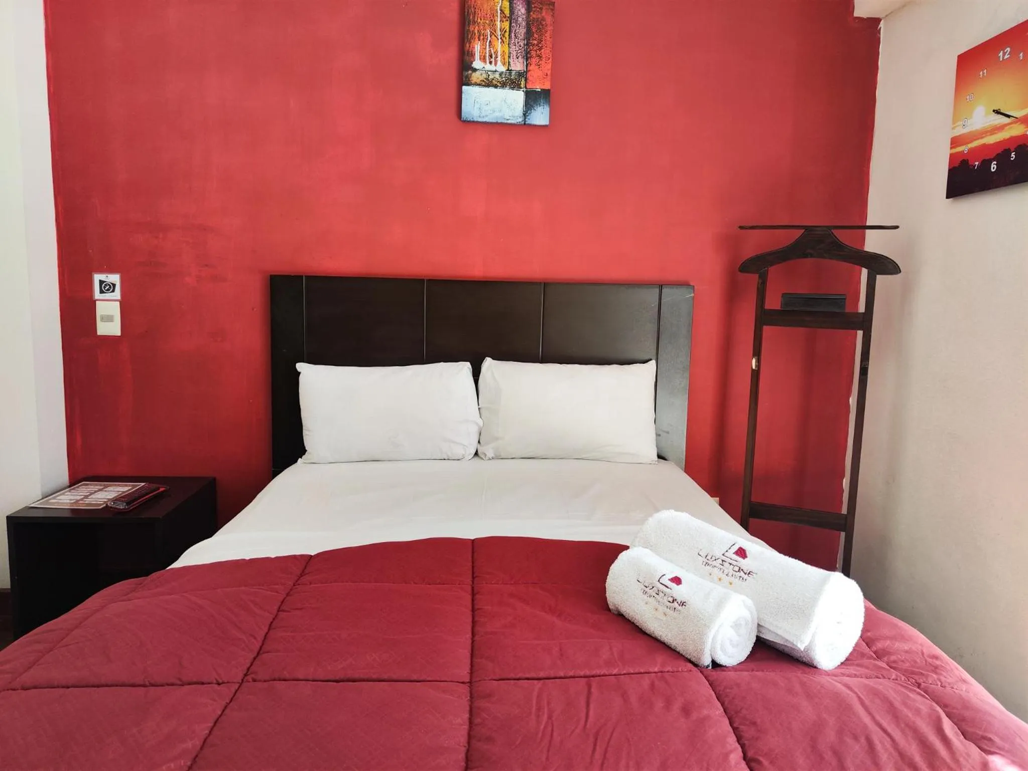 Bed in Luxstone Executive & Suites