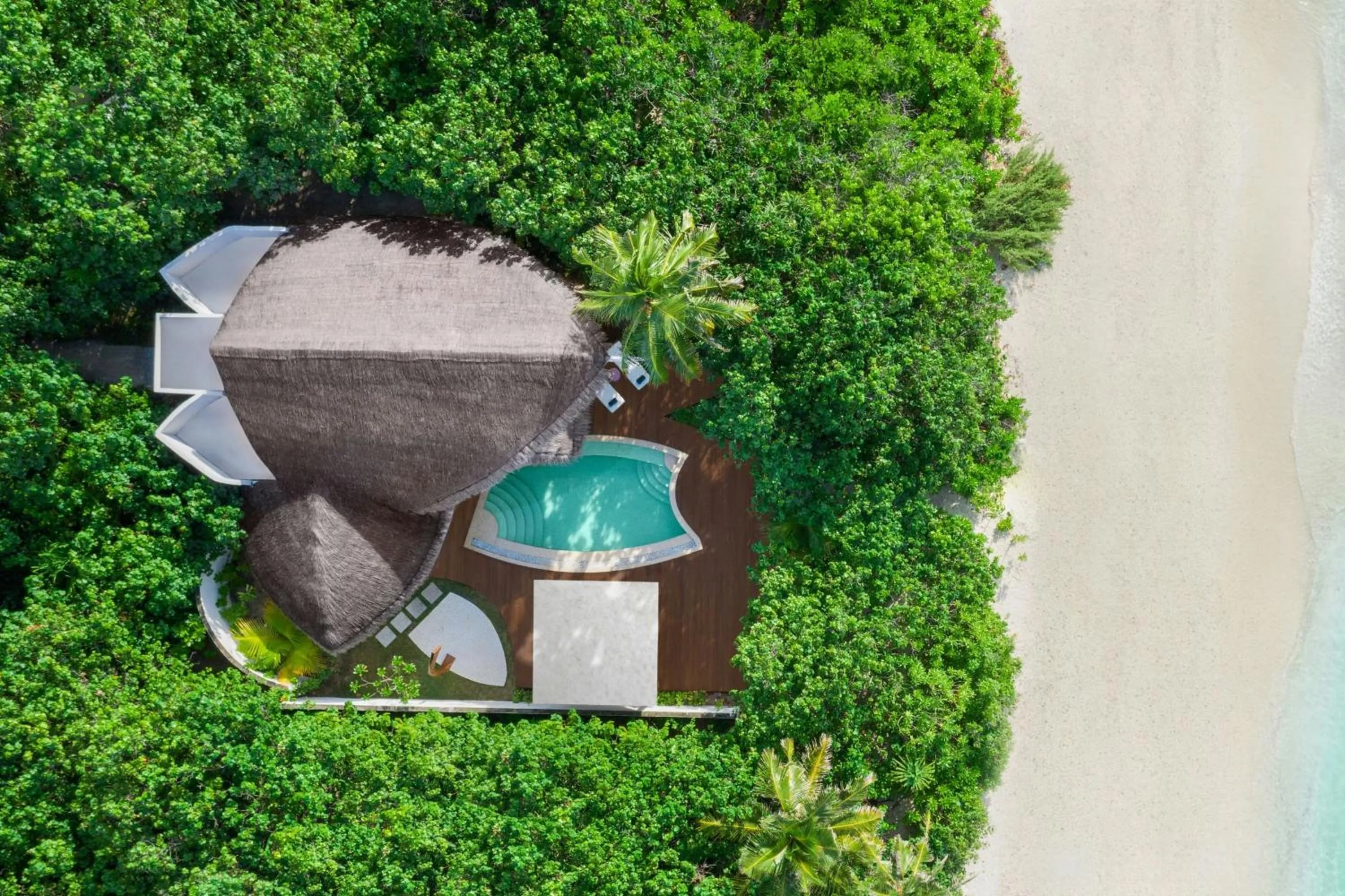 Swimming pool in JW Marriott Maldives Resort & Spa