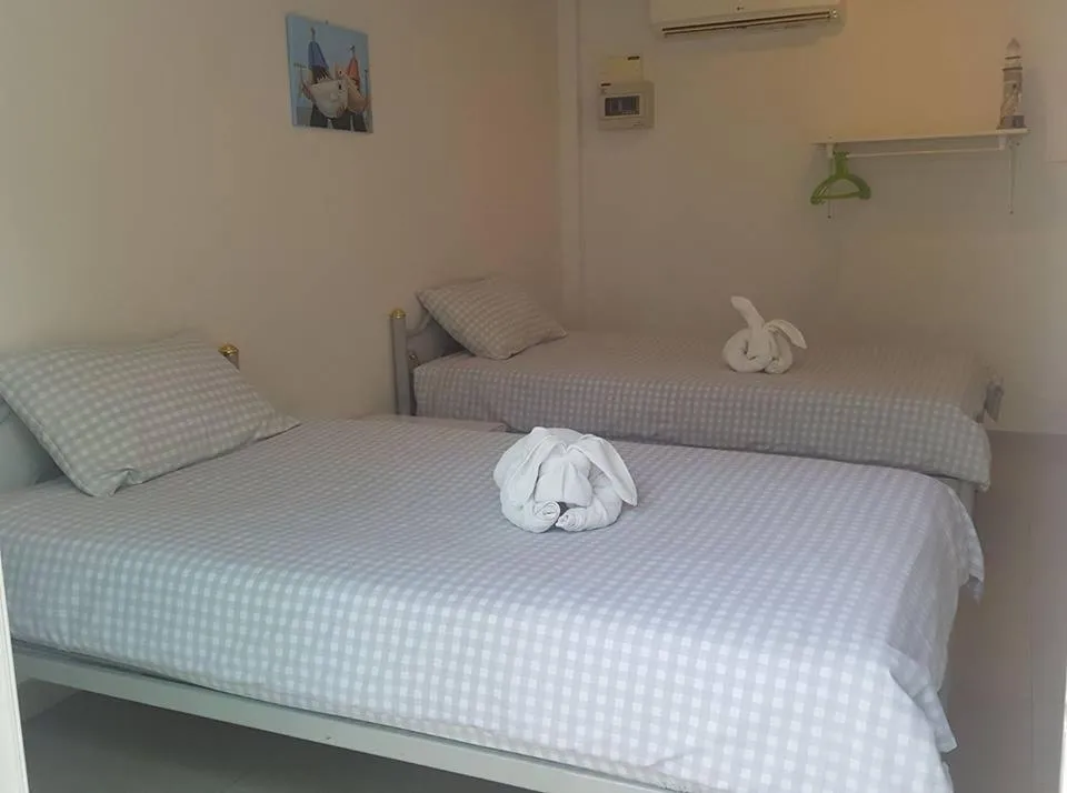 Bed in Charlie's Bungalows