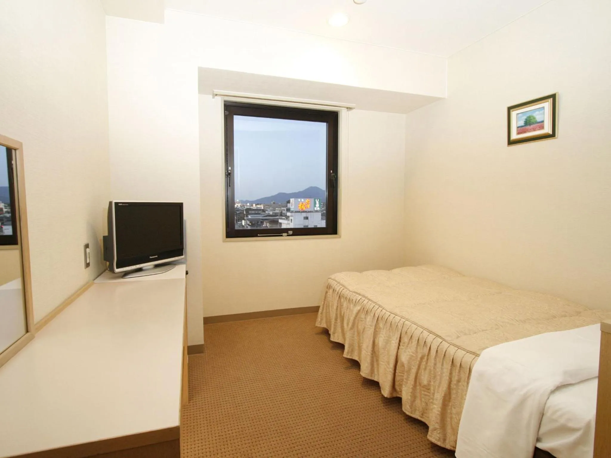 Photo of the whole room, Bed in Hotel Pearl City Tendo