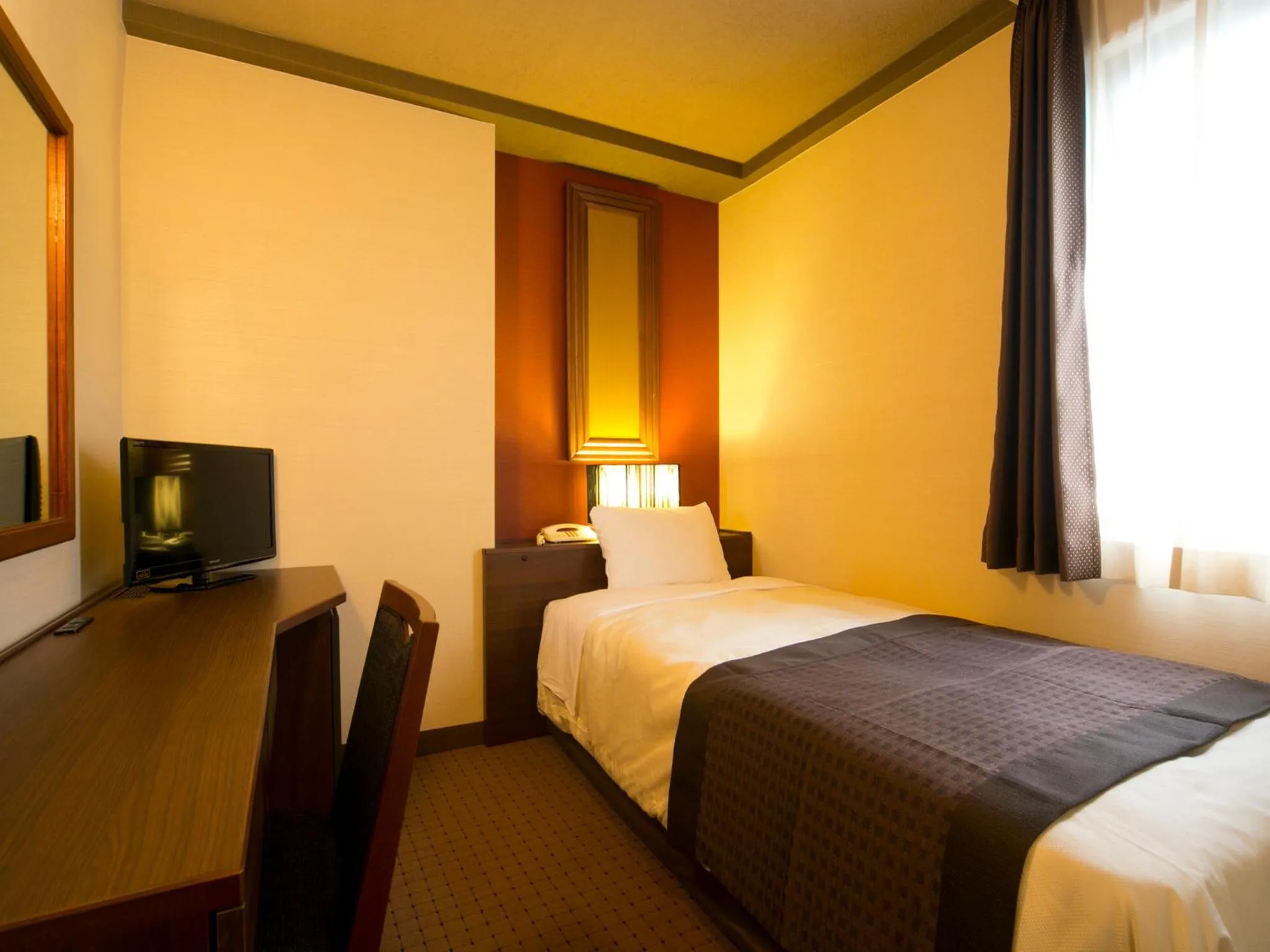 Photo of the whole room, Bed in Hotel Pearl City Akita Kawabata